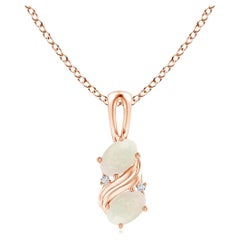 Colgante remolino de ópalo natural de dos piedras en oro rosa de 18 quilates