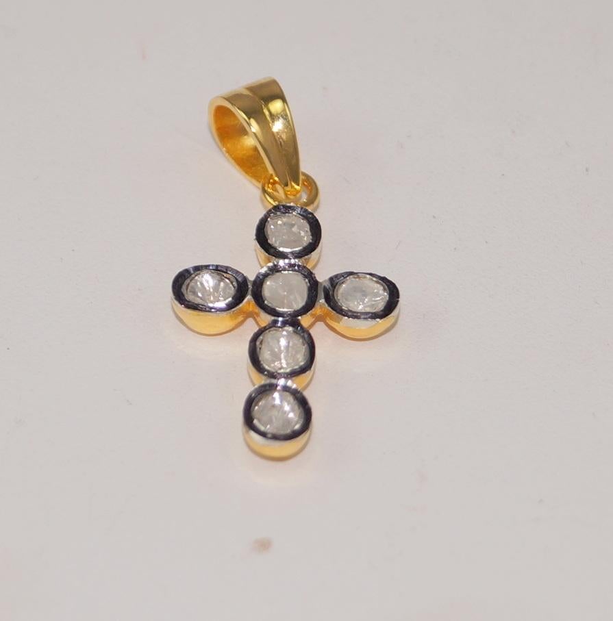 This beautiful handmade cross pendant consists of:
Diamond type- Uncut flat diamonds
Diamond weight- 1.80cts
Diamond color- white with the tint of yellow
Metal- Sterling silver
Metal purity- 925 silver
Color of Metal- 18k gold plated, oxidized look