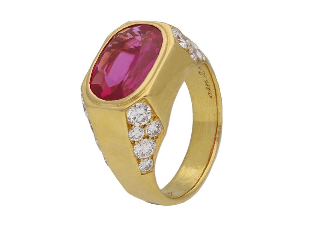 Bulgari Burmese ruby and diamond ring. A natural unenhanced oval old cut Burmese ruby is set horizontally to centre in an open back rubover setting with an approximate weight of 2.80 carats, flanked to the corners by four rows of round brilliant cut