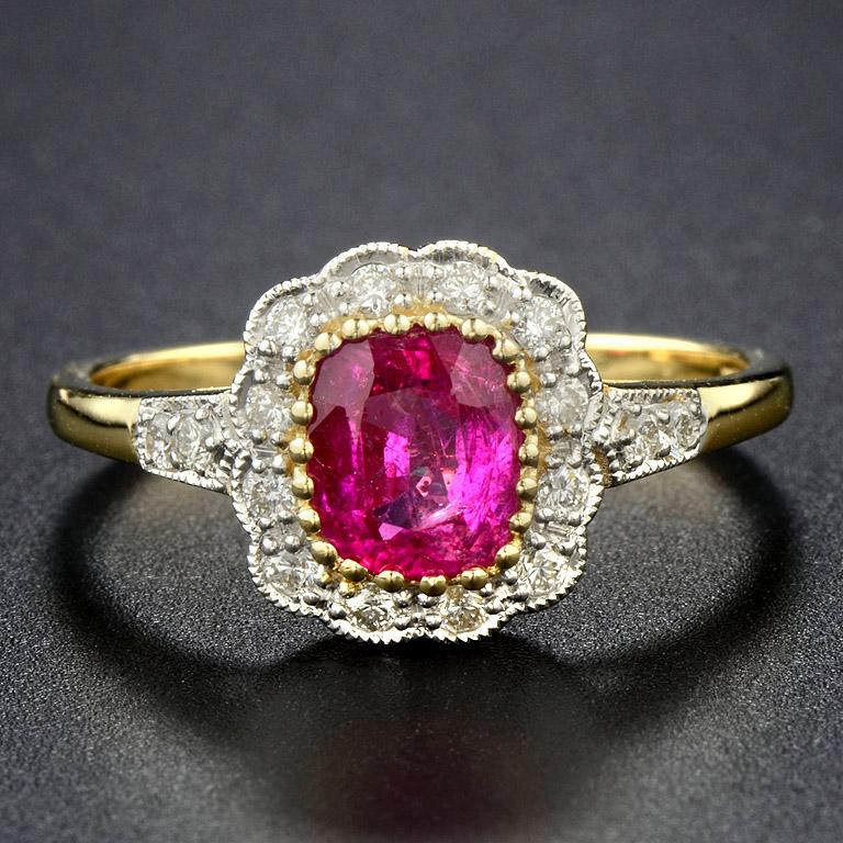 This vintage style ring was made in 18K Gold.   

The ring consists of... 
Natural Unheated Ruby 1.01 ct. 
Diamond H color SI clarity 0.26 ct.   

The ring was made in size US#7
* This Ruby has a Certificate
