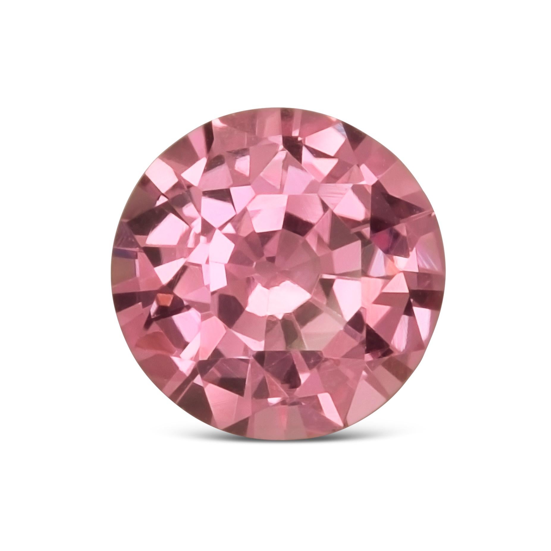 This 1.22-carat natural pink sapphire shines with a soft yet radiant pink hue, embodying elegance and charm. Cut in a round shape with brilliant/step faceting, it delivers excellent brilliance and balance. With no color zoning and a completely