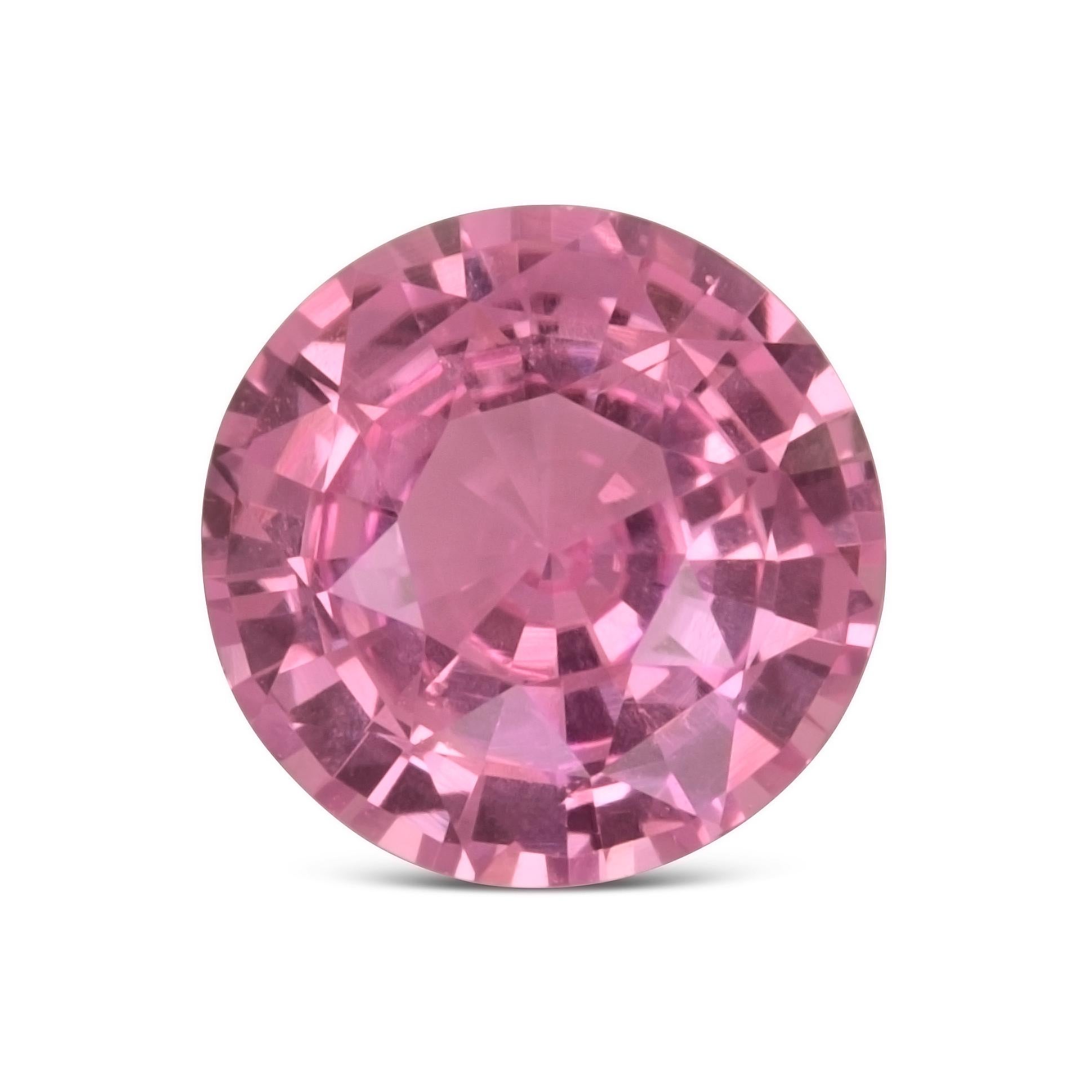This 1.37-carat natural pink sapphire glows with a vibrant purple-pink hue, exuding both romance and strength. Expertly cut in a round modified brilliant/step style, it maximizes brilliance while maintaining excellent balance and symmetry.