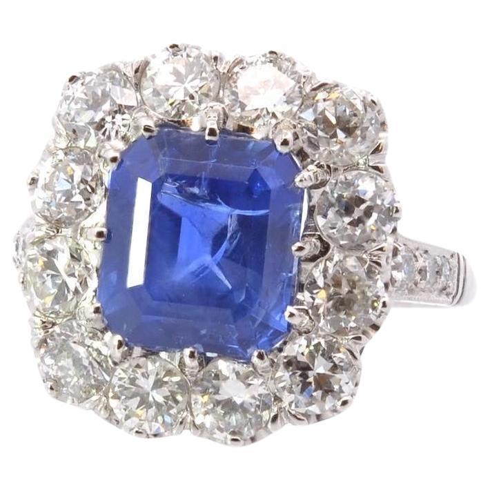 Natural unheated sapphire and diamond ring in platinum For Sale