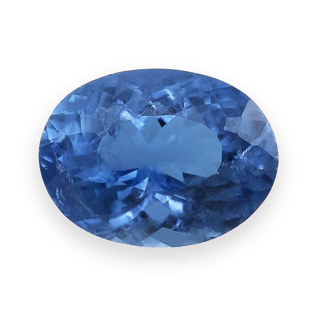 Experience the enchanting allure of this natural unheated Brazilian Paraiba tourmaline, weighing 0.80 carats. With its rare violetish blue hue, oval shape, and radiant modified brilliant cut, this gemstone offers both elegance and rarity. Unheated
