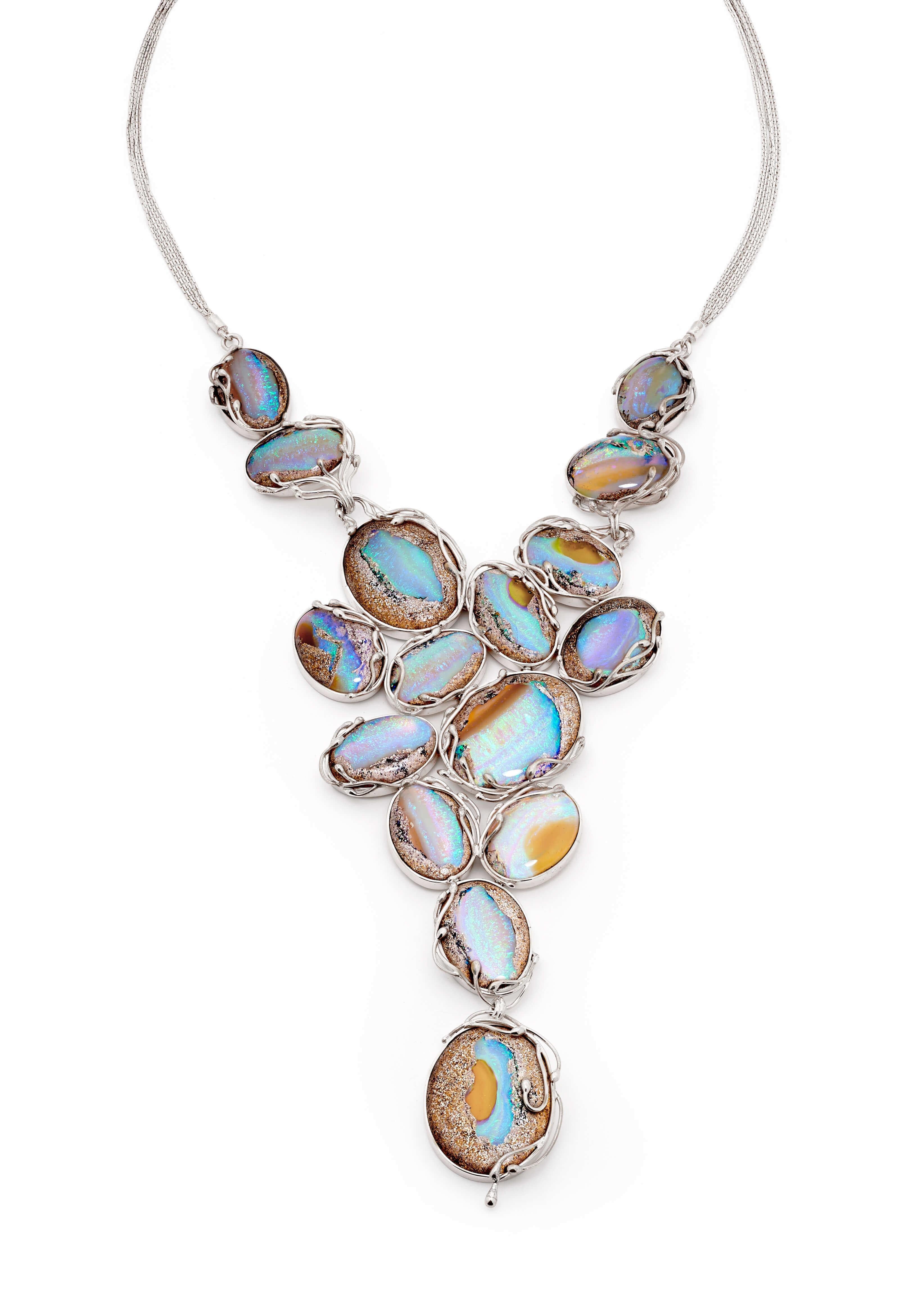 The regally sizeable ‘Cordelia’ boulder opal necklace set in sterling silver has style and substance, truly living up to its name of being the ‘jewel of the sea’. The gemstones of this precious pendant hail from our own opal mines in