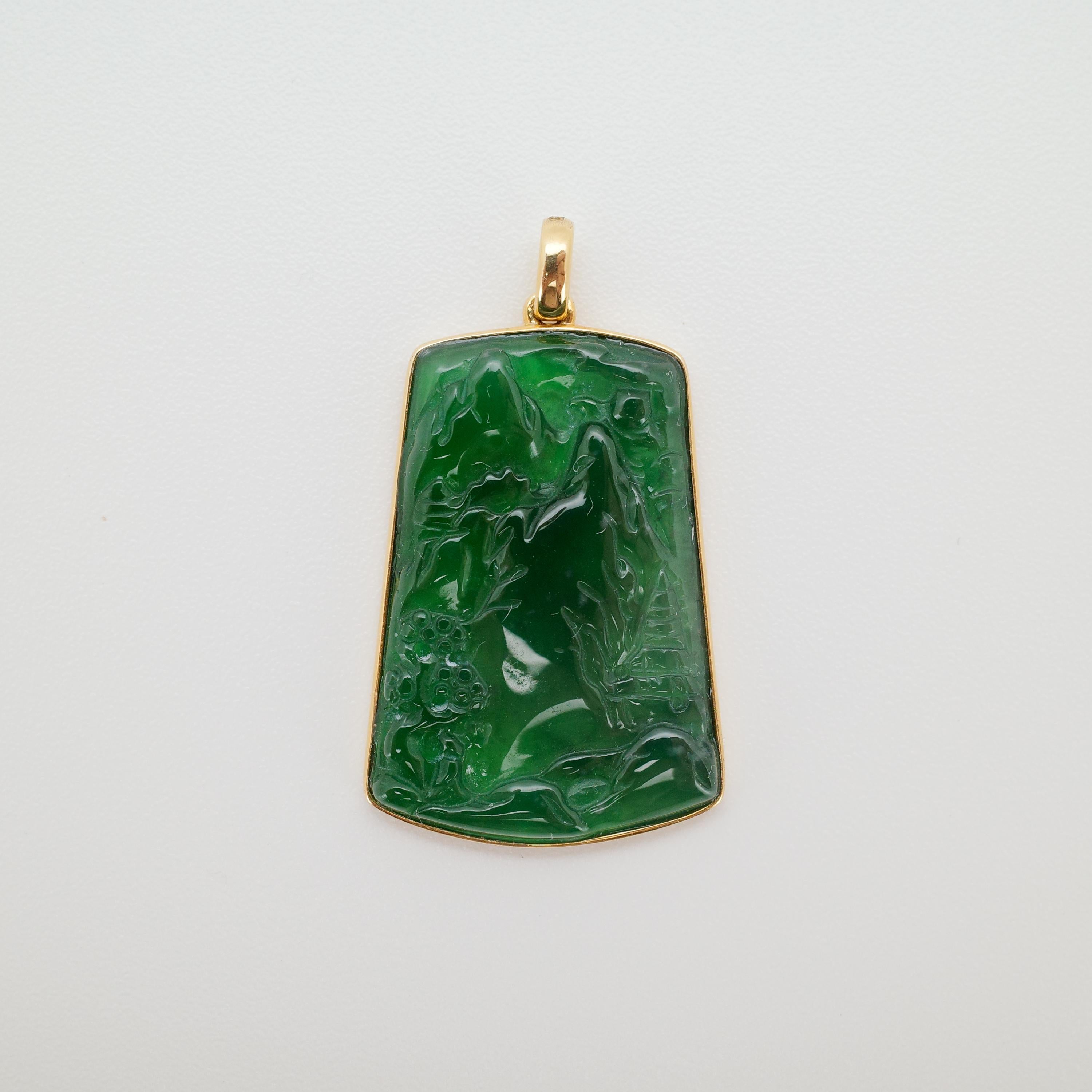 This remarkable pendant showcases a hand-carved natural and untreated Fei Cui jade plaque—GIA’s updated terminology for the jadeite–omphacite family of true jade—here represented by an unusually vivid and translucent Guatemalan jade of exceptional