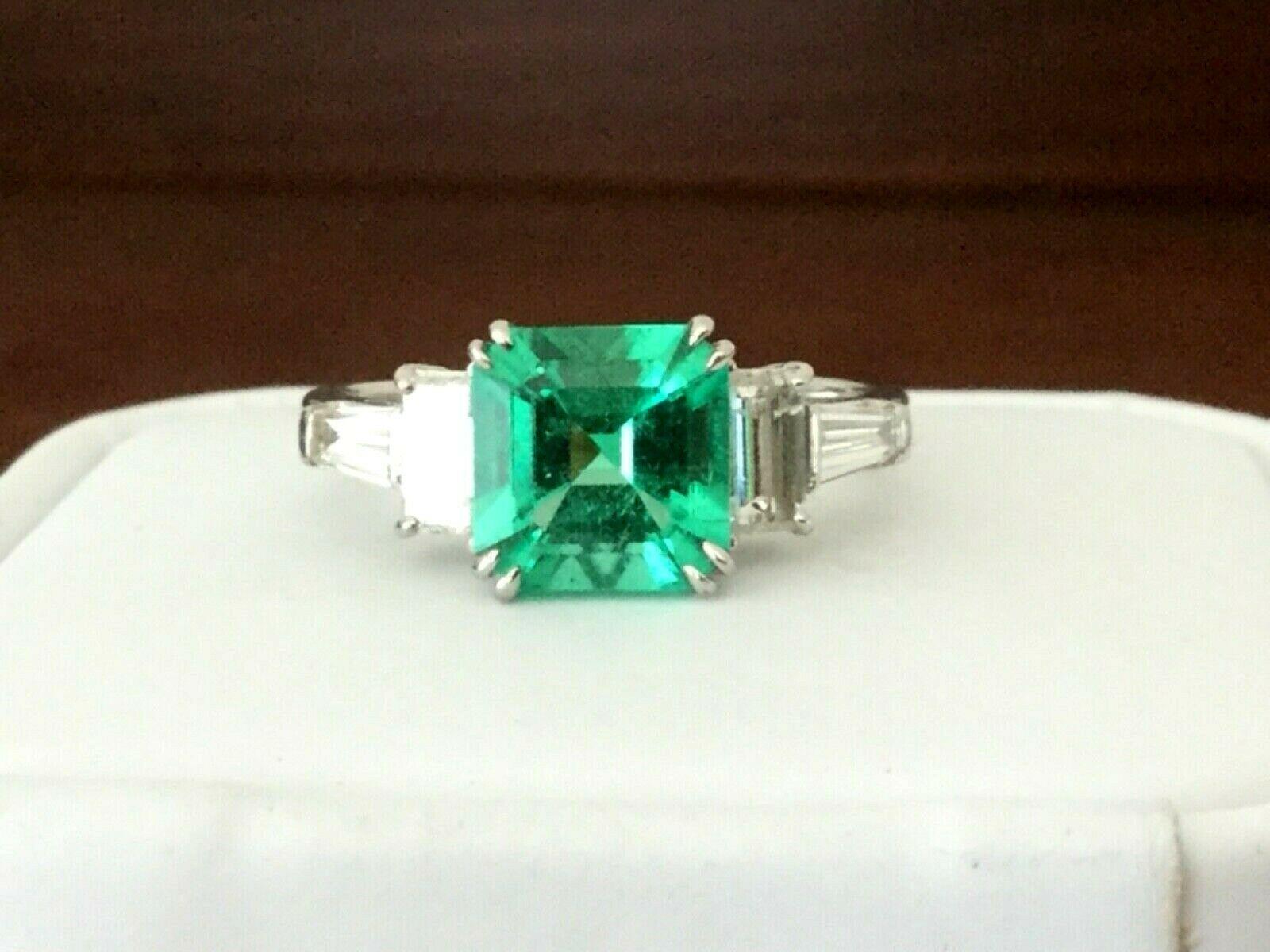 For your consideration is an ULTRA-RARE UNTREATED 2.04 carat octagonal shaped, natural, transparent, green emerald set in a brand new 18k white gold setting with .90 carats of natural G color SI clarity white diamonds.  The untreated emerald is GIA