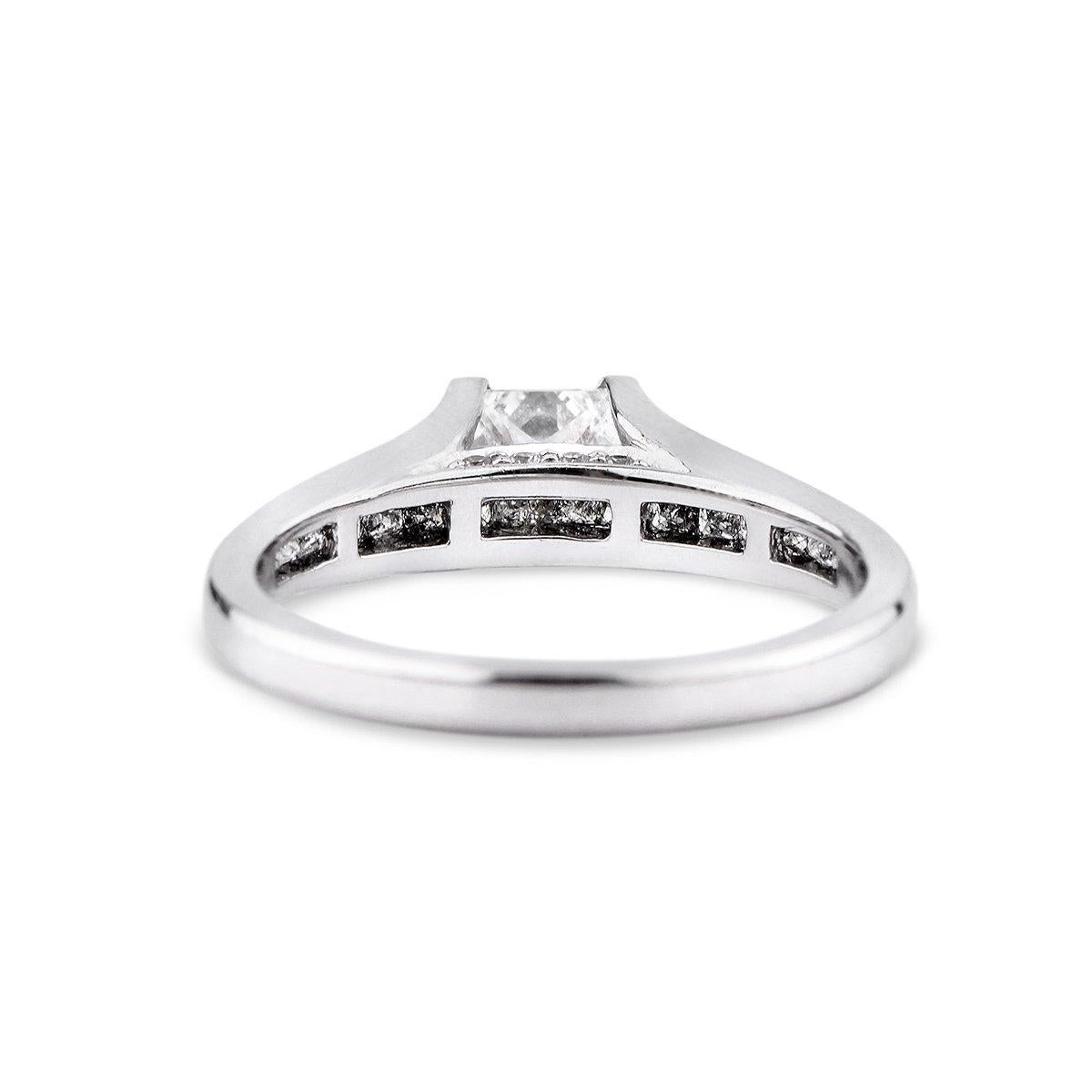 This stunning engagement ring consists of Natural untreated white diamonds with a total carat weight of 0.50. Expertly crafted using 18 Karat White Gold. Princess Shape.
This piece can be resized accordingly.

A diamond is a stone that truly states,