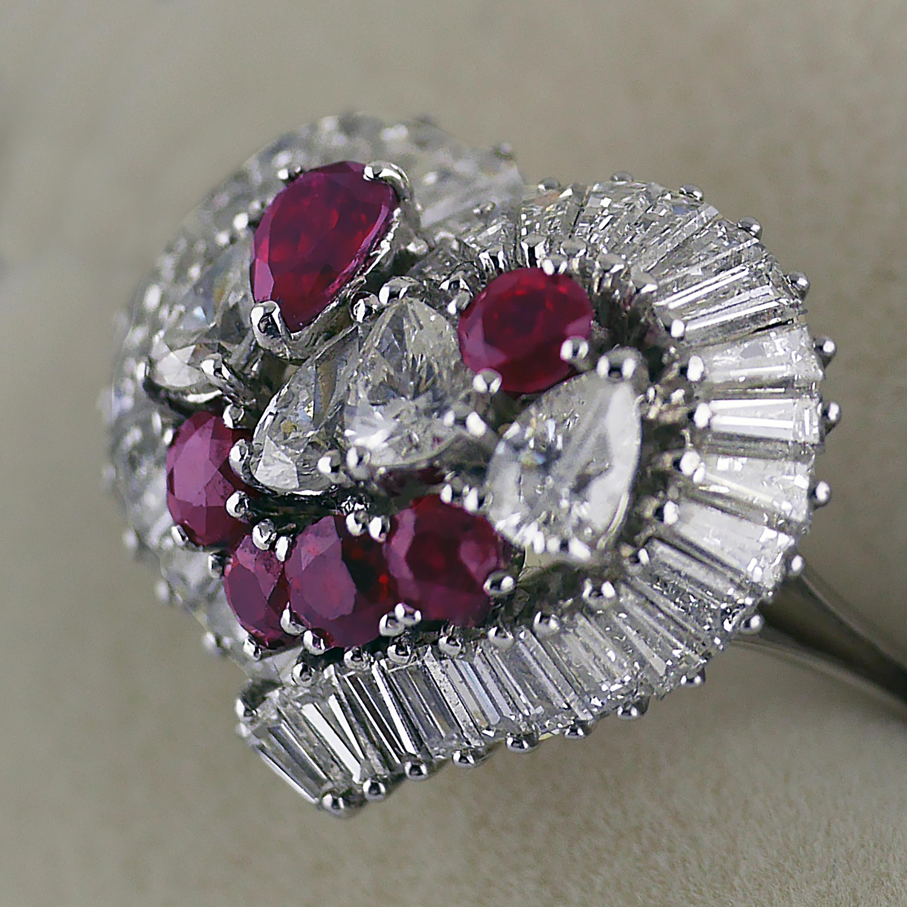 Vintage heart shaped ring with fine and lively natural untreated “Pidgeon Blood” Rubies and diamonds, made in 1975 with London hall mark.

6 well matched “Pidgeon Blood”  rubies with good colour saturation, approximately 1.0ct (Total)

The rubies
