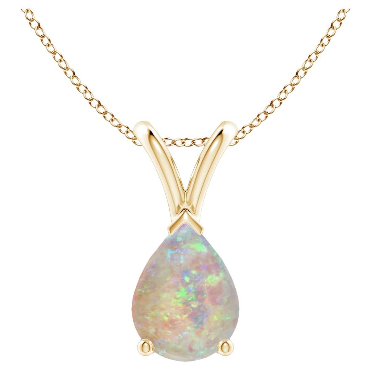 ANGARA Natural Pear-Shaped 0.70ct Opal Solitaire Pendant in 14K Yellow Gold For Sale