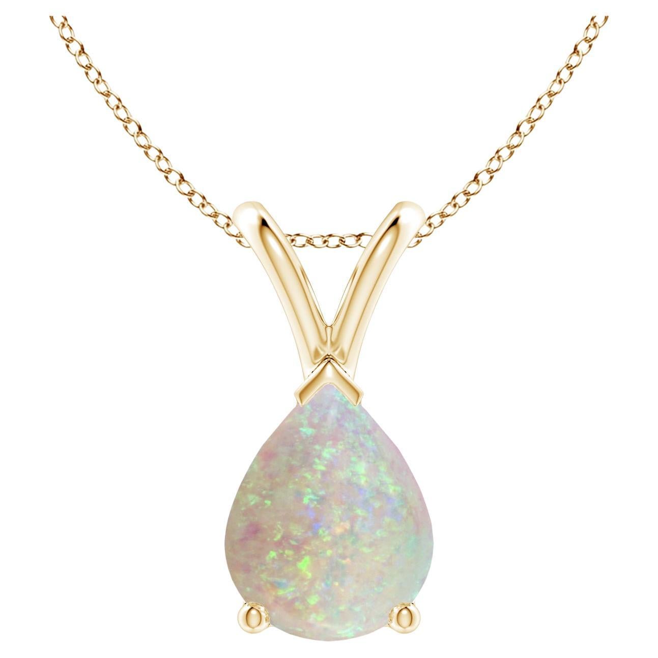 ANGARA Natural Pear-Shaped 0.90ct Opal Solitaire Pendant in 14K Yellow Gold For Sale