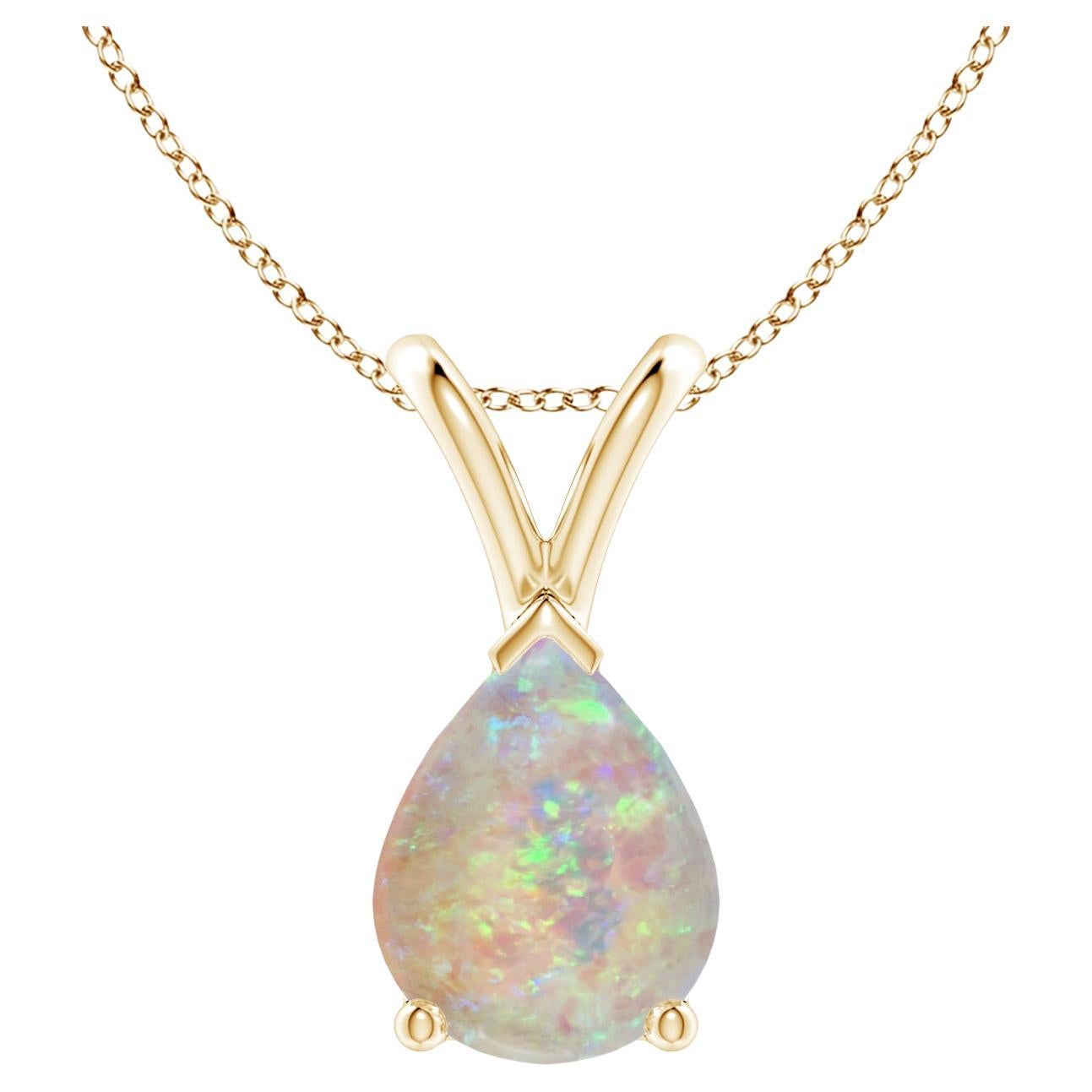 ANGARA Natural Pear-Shaped 0.90ct Opal Solitaire Pendant in 14K Yellow Gold For Sale