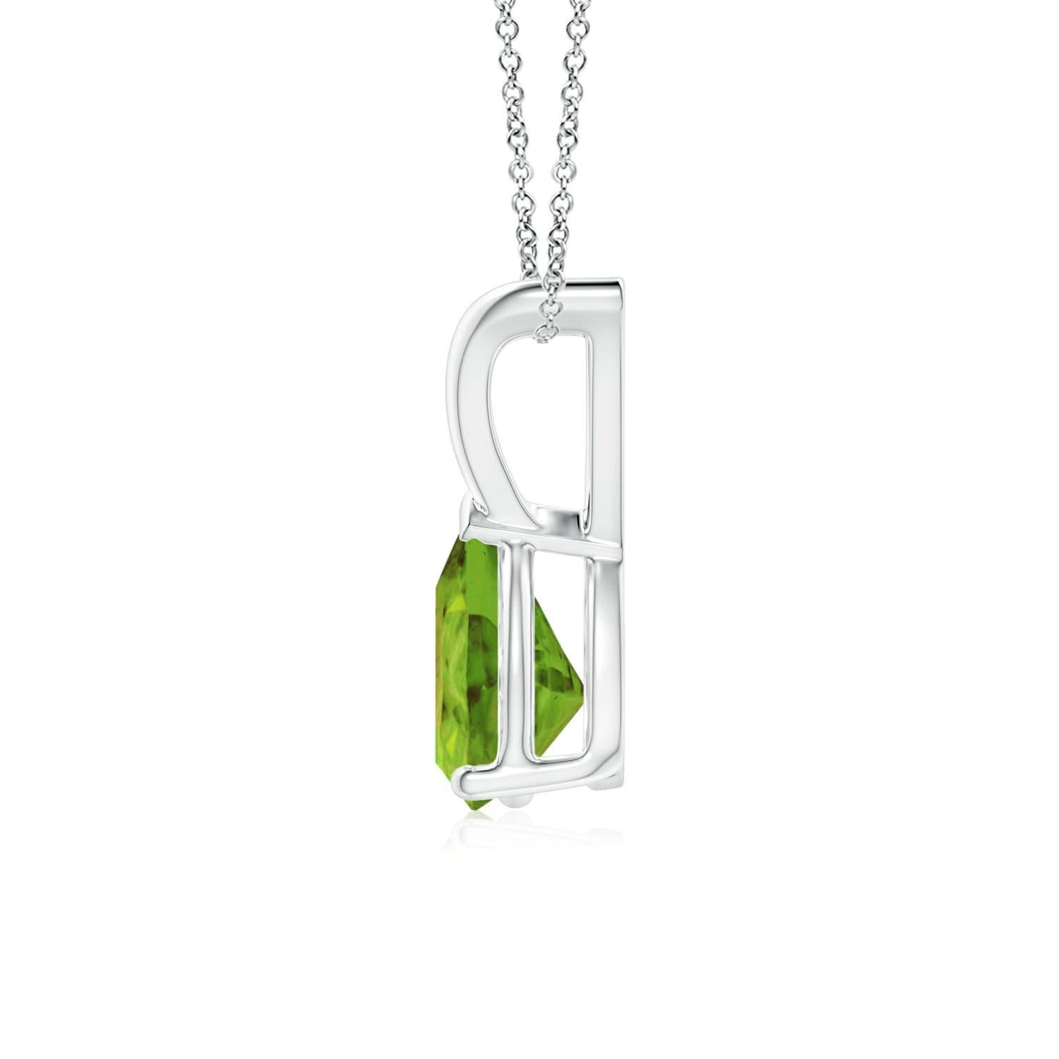 Questo classico ciondolo solitario con peridoto in oro bianco 18 carati ha un aspetto elegante con il suo design minimalista. Legato a una lucida balla a V, il magnifico peridoto a forma di pera affascina con la sua tonalità giallo-oro.