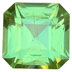 Peridoto verde vibrante naturale da 3,93 carati con taglio a smeraldo, gemma sfusa per anello