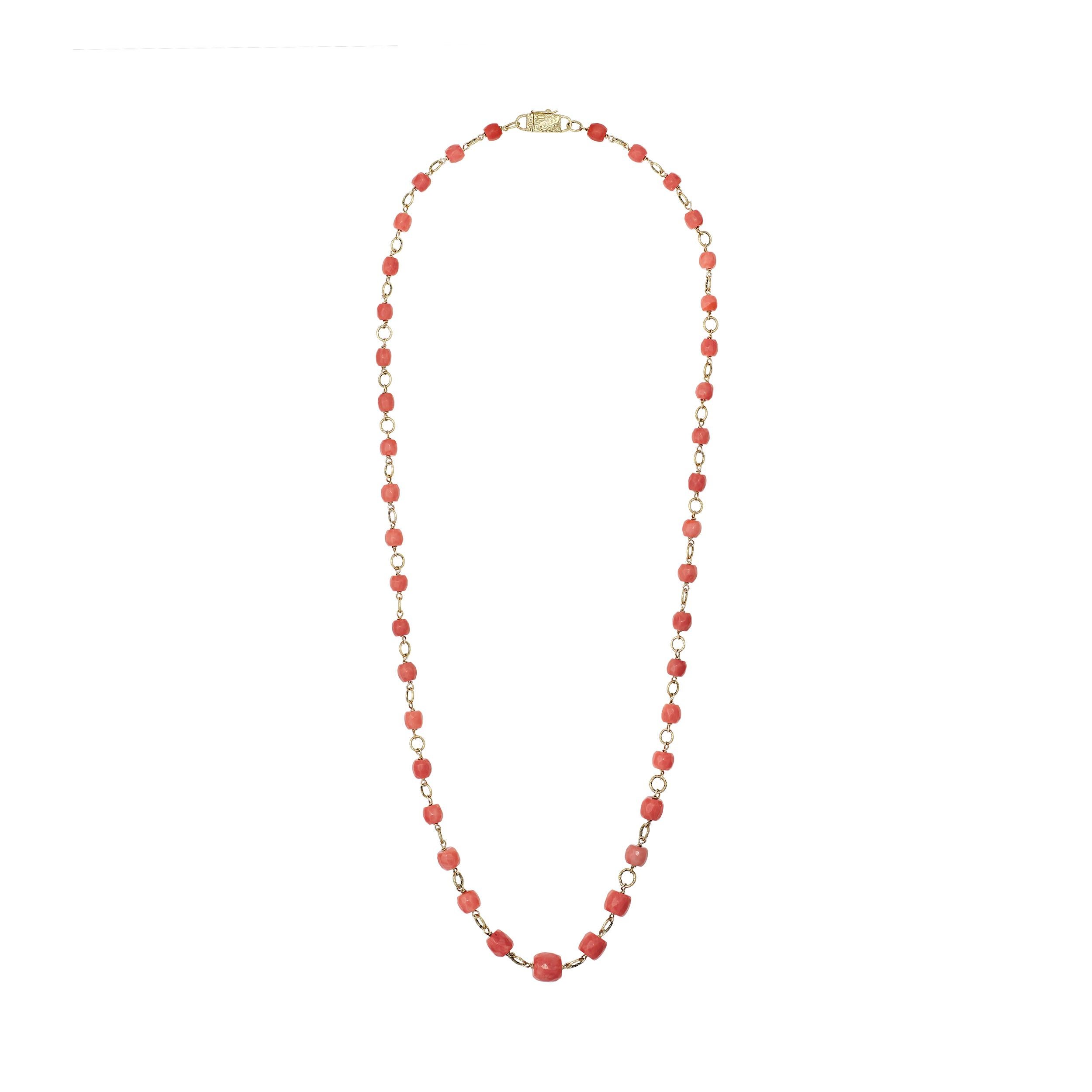 What a wonderful vintage find!  This necklace features forty-three Sardinian Salmon Colored Coral cut into faceted barrel shape beads ranging from 6.30 - 11.50 mm in size.

The clasp is signed 