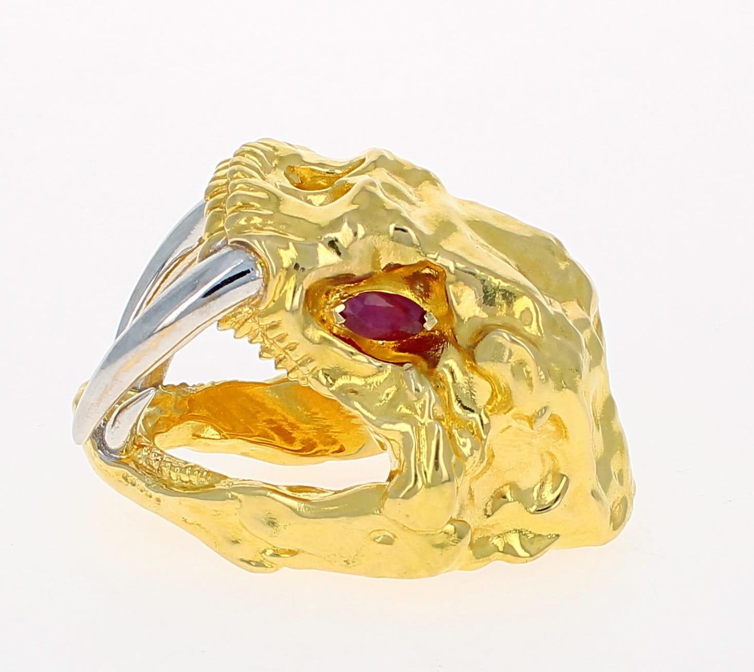 An 18K Solid Gold Monster. Weighing 123 grams with 1.50ccttw of natural Ruby for eyes. This piece is one of a kind and can be seen from across the room. Size 11