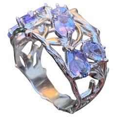 Bague en argent sterling 925 sertie de 8 tanzanites violettes naturelles de taille ovale