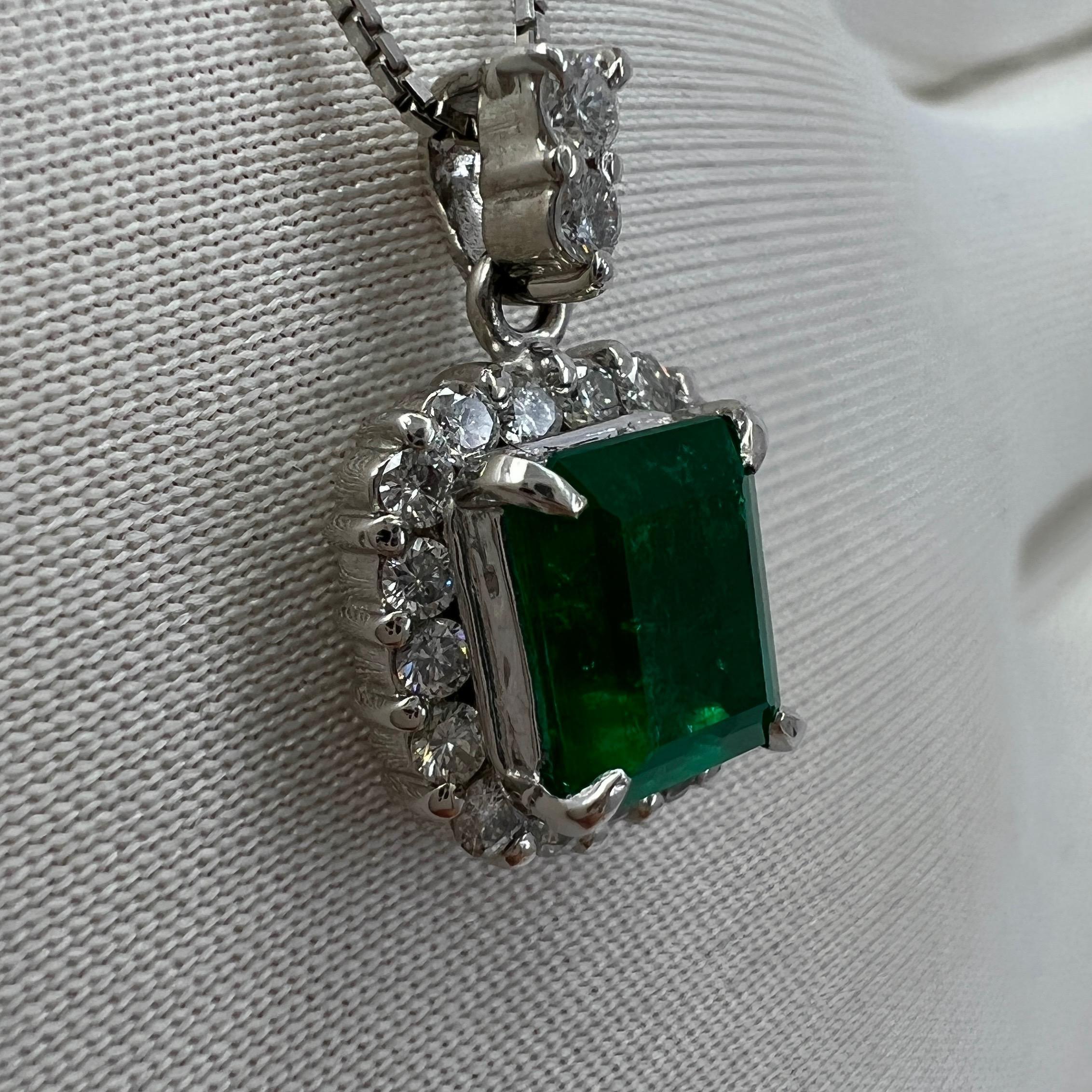 Emerald Cut Natural Vivid Green Colombian Emerald Diamond Platinum Cluster Pendant Necklace For Sale