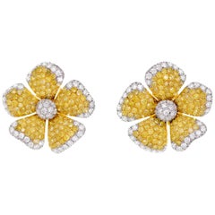Boucle d'oreille fleur en diamant naturel jaune vif et diamant blanc