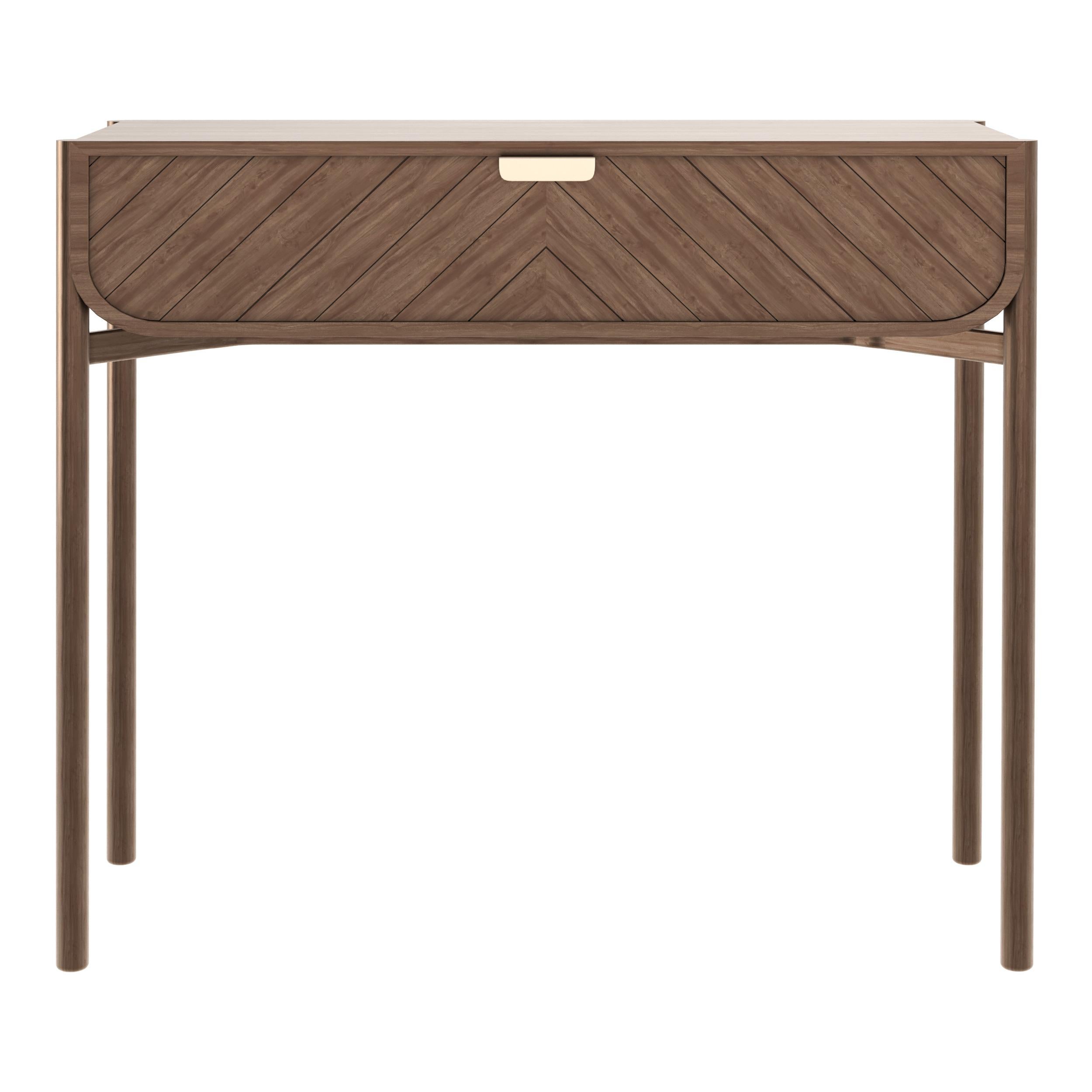 Natural Walnut Marius Console Table by HARTO
Dimensions: W 100 x D 36.5 x H 90 cm. 
Materials: Solid Wood, MDF wood veneer.  
Weight: 20.0 kg

The Marius console, with its drawer engraved with chevrons and its refined brass handle, is suitable for