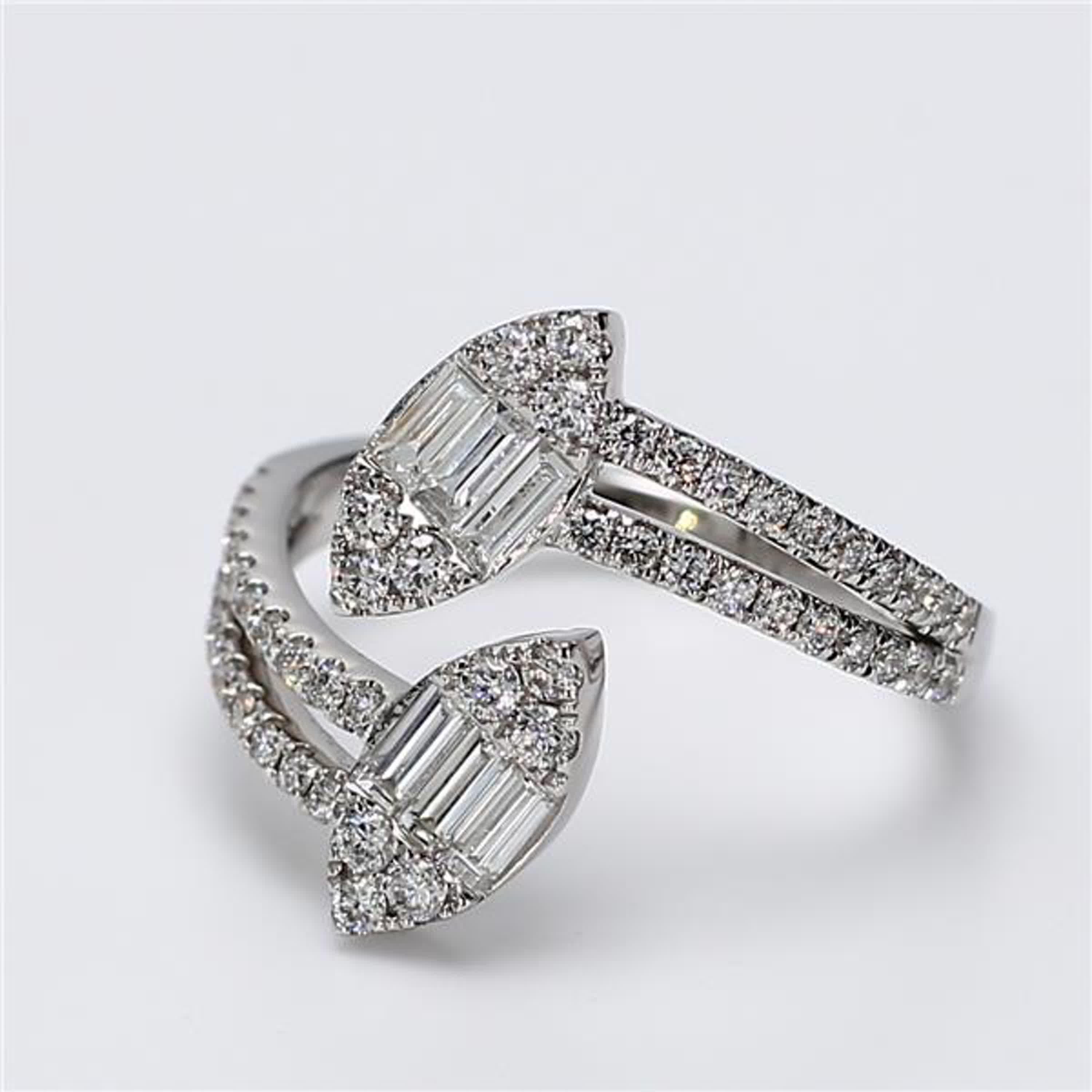 RareGemWorld's classic diamond ring. Mounted in a beautiful 18K White Gold setting with natural baguette white diamonds complimented by natural round white diamond melee. This band is guaranteed to impress and enhance your personal