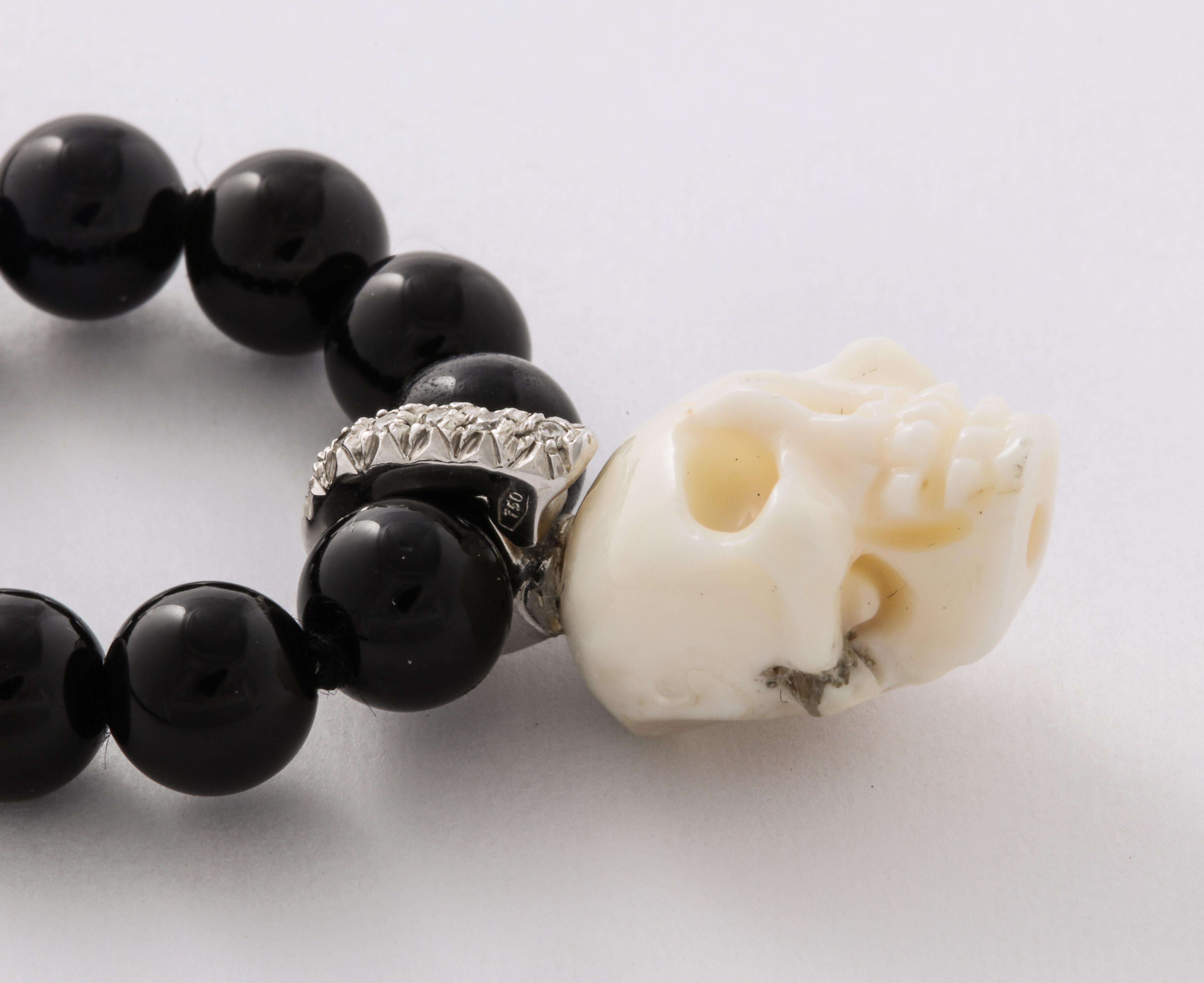 Women's or Men's Natural White Coral Carved Skull Paved Diamonds On Onyx Beads 18k Gold Clasp For Sale