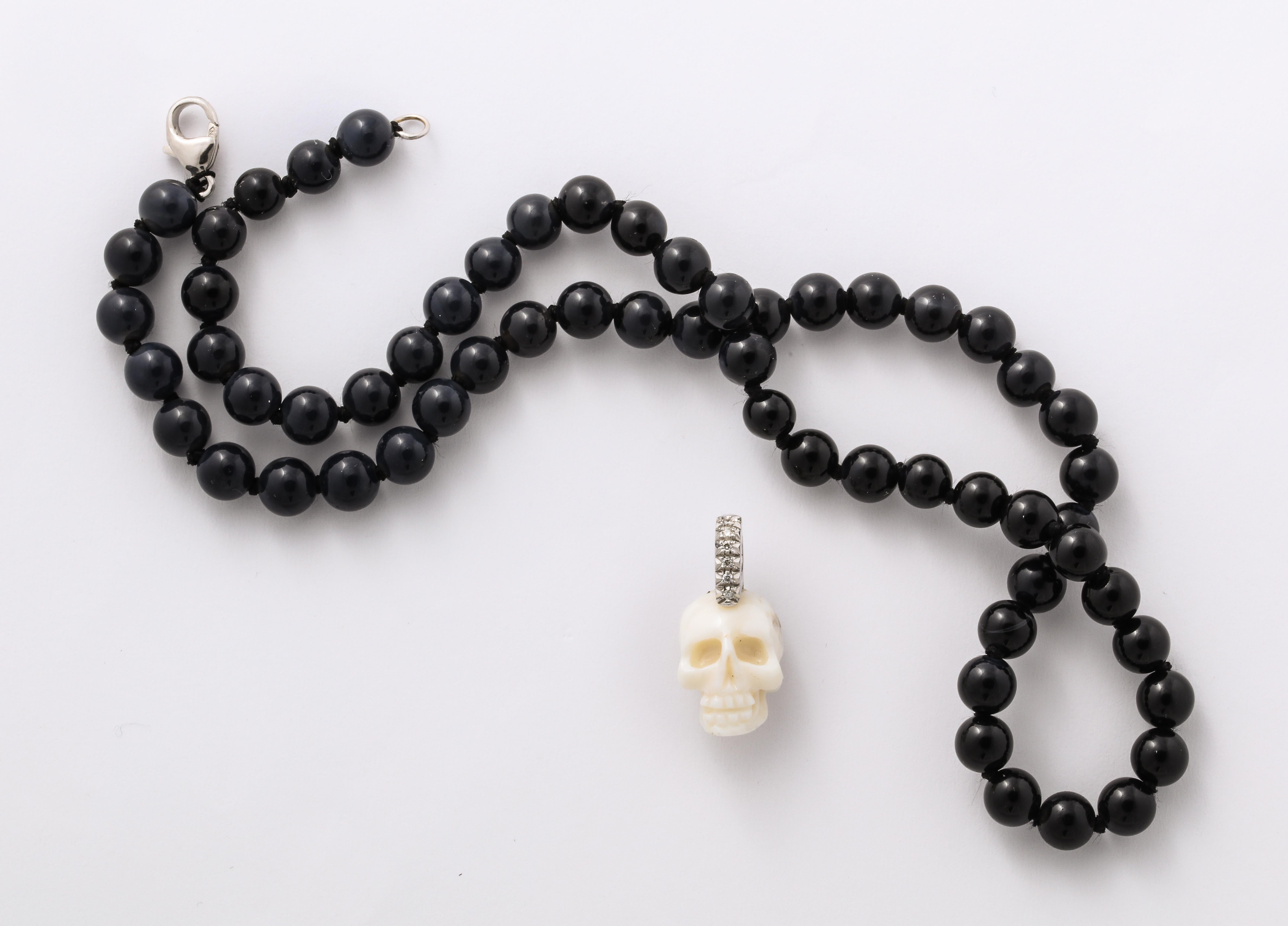Natural White Coral Carved Skull Paved Diamonds On Onyx Beads 18k Gold Clasp For Sale 2