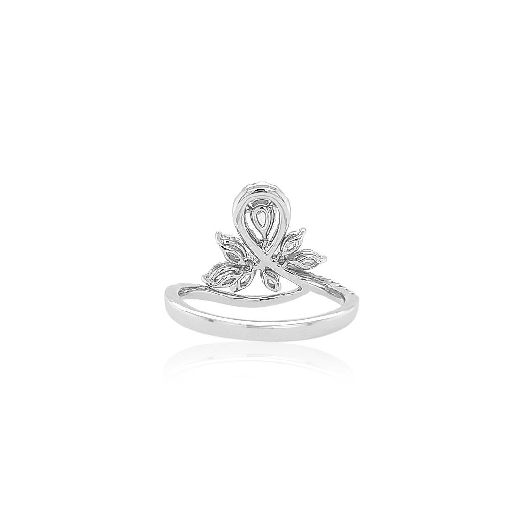 This bold statement fashion ring features scintillating Pear-shape White diamonds set amongst contemporary arrangements of Marquise-shape and Round diamond swirl. Unique and striking, this exceptional ring will be a welcomed edition for any