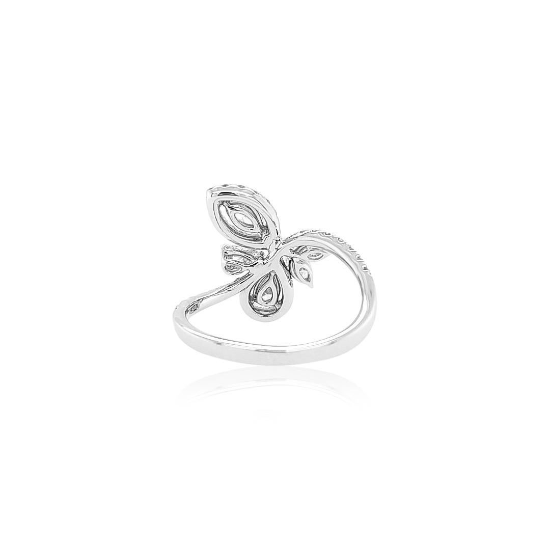 This bold statement cocktail ring features superb quality Pear-shape White diamonds set amongst an elegant arrangement of Marquise diamond clusters. Unique and striking, this exceptional ring will be a welcomed edition for any impressive jewellery