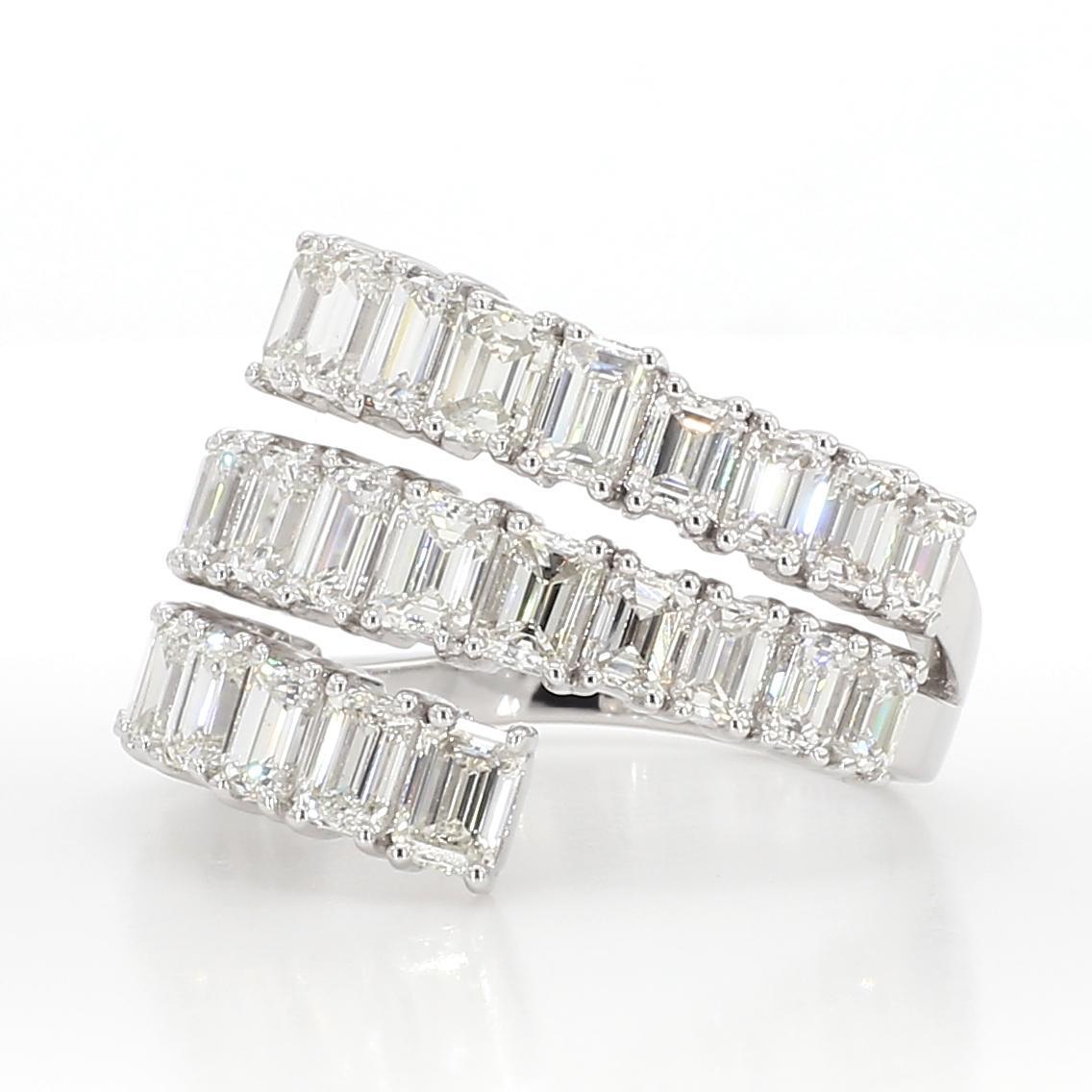 RareGemWorld's beautiful diamond band. Mounted in a beautiful 18K White Gold setting with natural emerald cut white diamonds surrounded by natural. This band is guaranteed to impress and enhance your personal collection!

Total Weight: