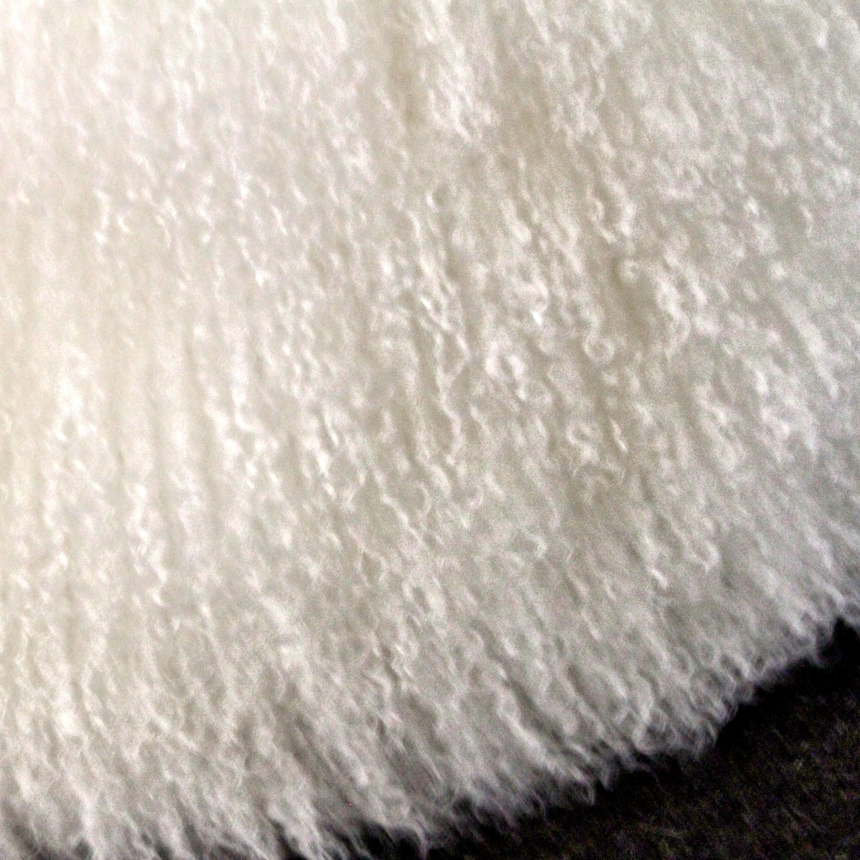 Otomana de piel blanca natural, puf de piel de oveja de Mongolia Regencia de Hollywood en venta