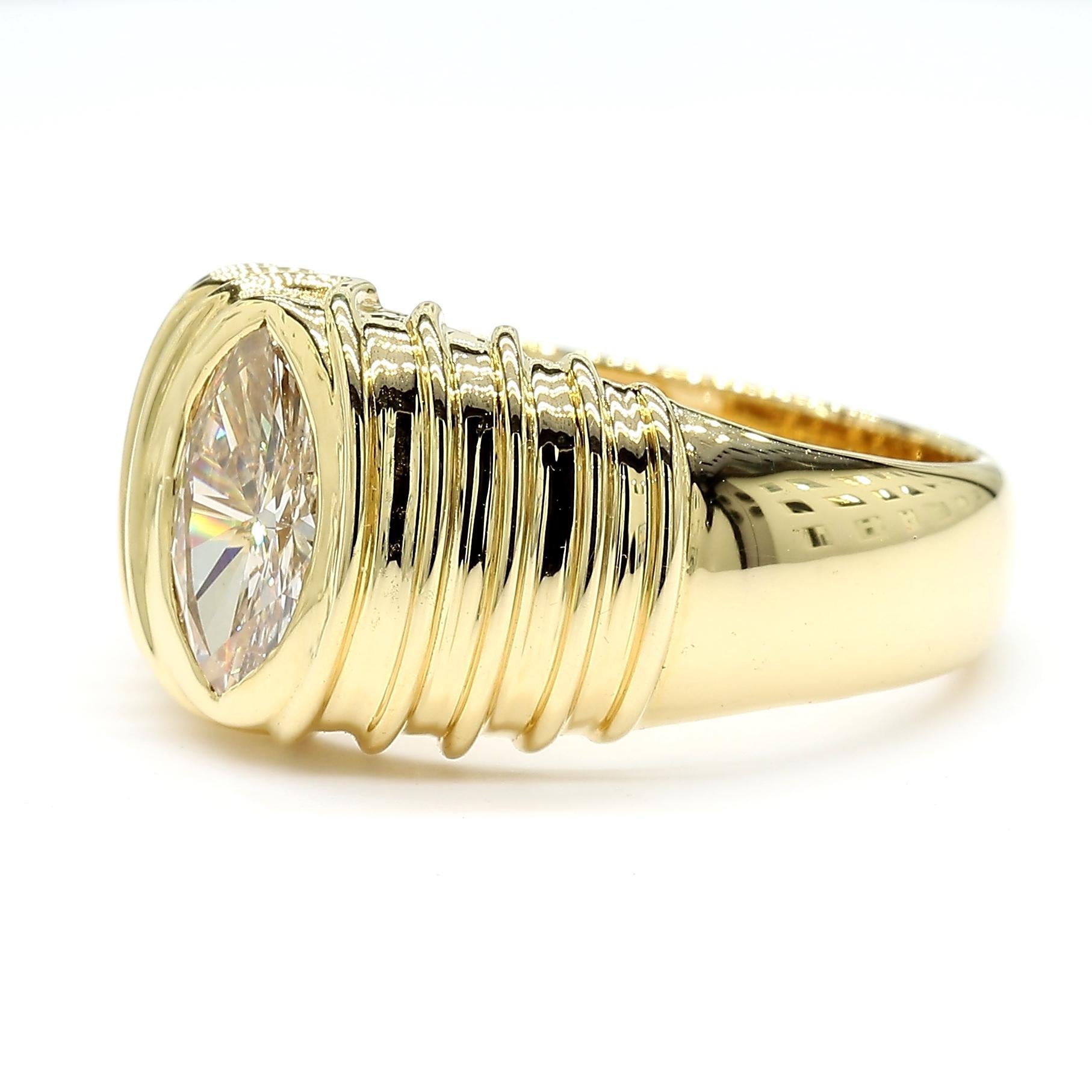 RareGemWorld's beautiful diamond band. Mounted in a beautiful 18K Yellow Gold setting with a natural marquise cut white diamond. This band is guaranteed to impress and enhance your personal collection!

Total Weight: 1.65cts

Natural Marquise-Cut