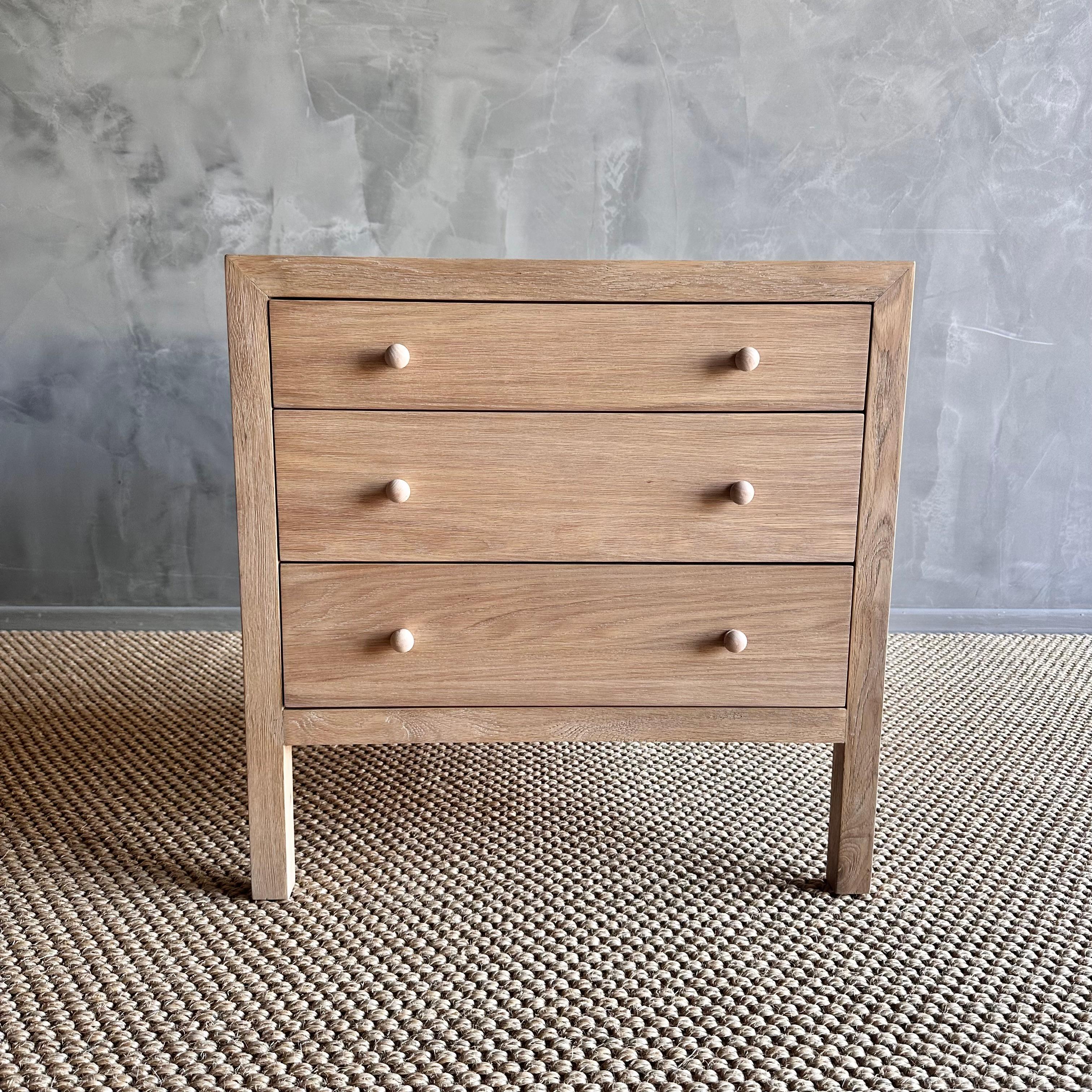 The Harper 3 drawer nightstand in white oak  is the perfect choice for those looking to add a contemporary flair to their bedroom. The finish of the white oak wood brings a sense of warmth and sophistication to any space.

The 3-drawer provides
