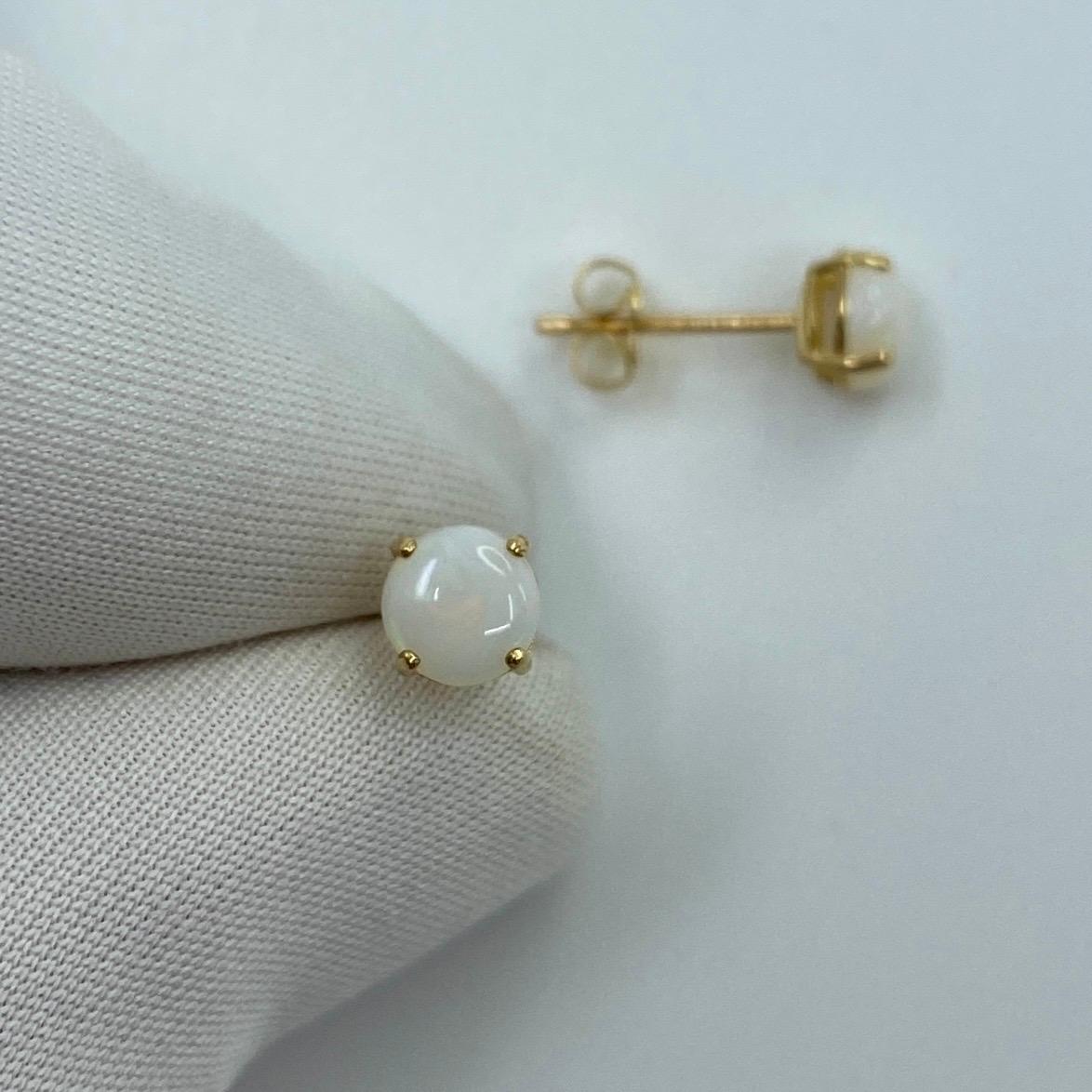 Natural White Opal Yellow Gold Earring Studs.

Beautiful 5mm matching pair of opals with excellent colour, clarity and round cabochon cut.

Set in lightweight 9k yellow gold suds with butterfly backs.

Perfect matching pair.

Brand new and never