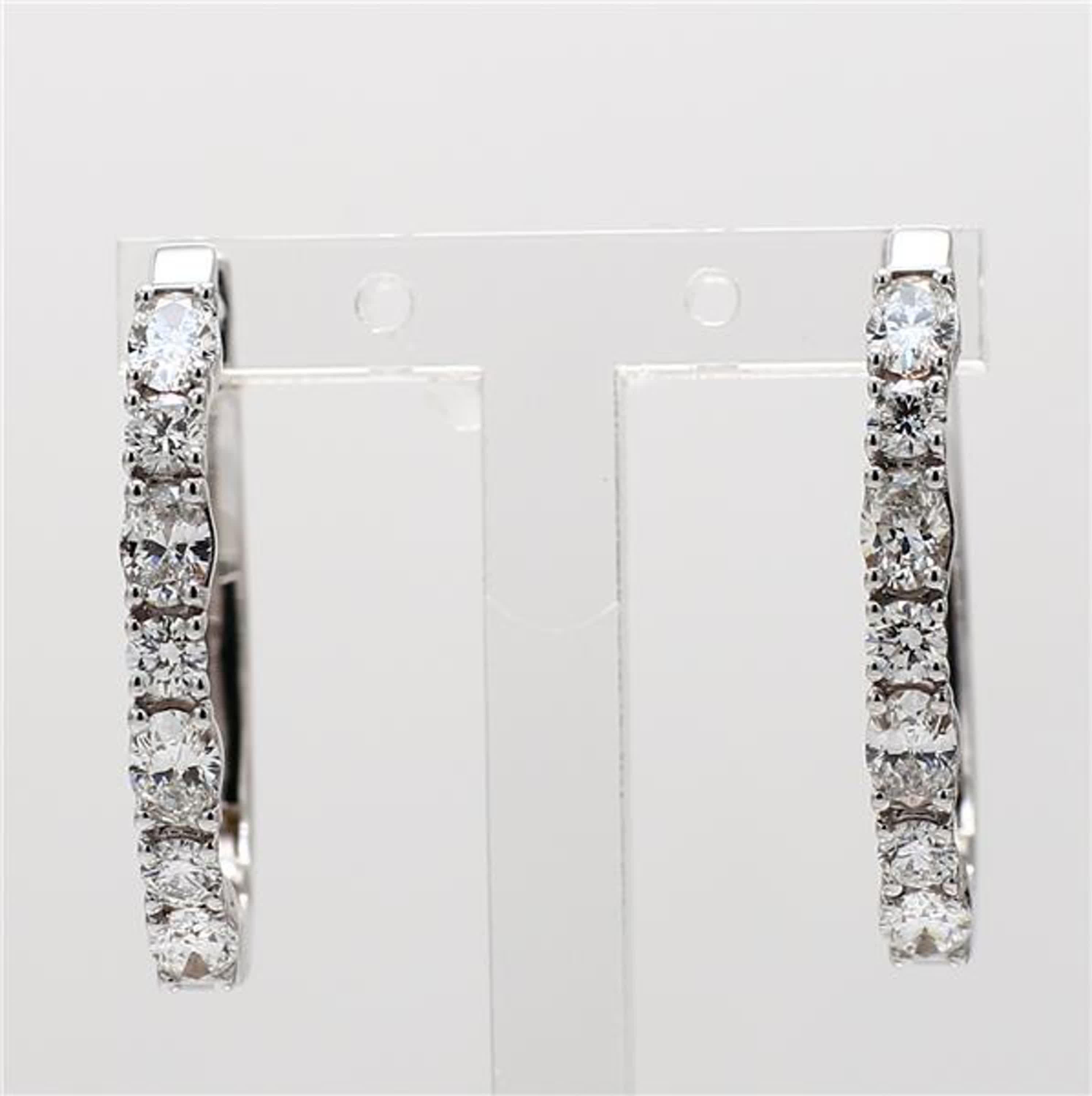 RareGemWorld's classic diamond earrings. Mounted in a beautiful 18K White Gold setting with natural oval cut white diamond and natural round cut white diamonds. These earrings are guaranteed to impress and enhance your personal collection!

Total
