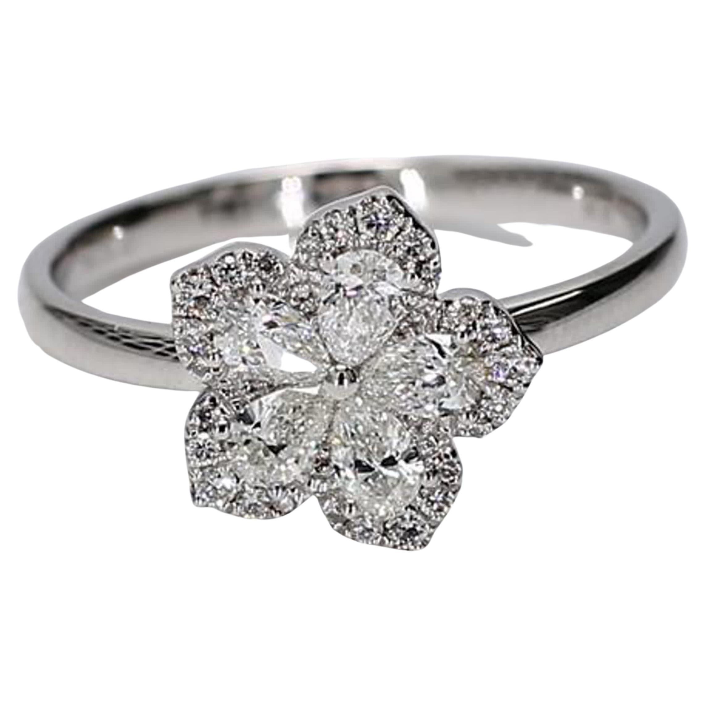 Natural White Pear and Round Diamond .52 Carat TW White Gold Fashion Ring For Sale