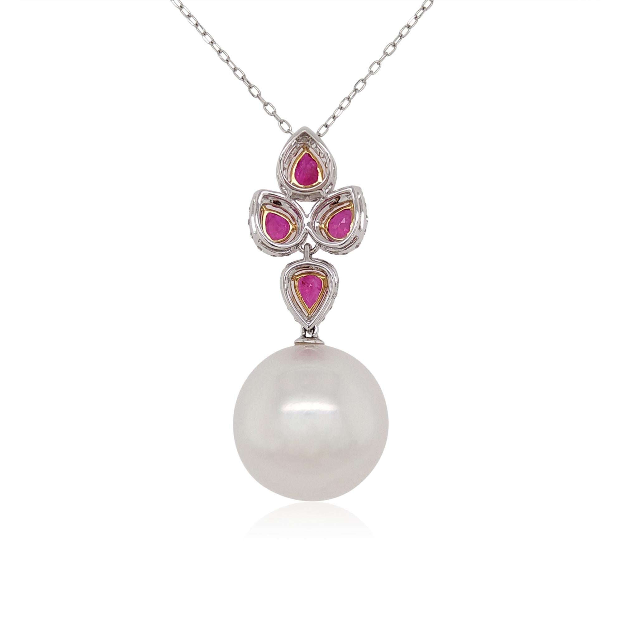 This unique pendant features a striking 16mm round White Pearl beneath a contemporary, Rubies and White Diamond-traced twist. The perfect piece to take you from day to night, this pendant will elevate any outfit - especially when paired with