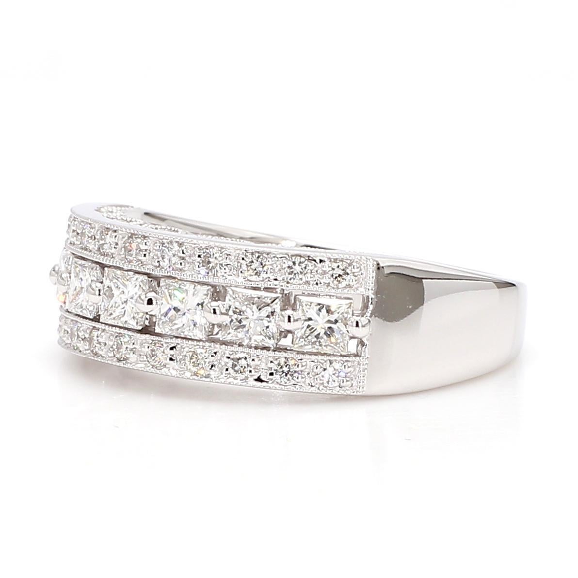 RareGemWorld's intriguing diamond band. Mounted in a beautiful 18K White Gold setting with natural princess cut white diamonds. The diamonds are surrounded by round natural white diamond melee. This band is guaranteed to impress and enhance your