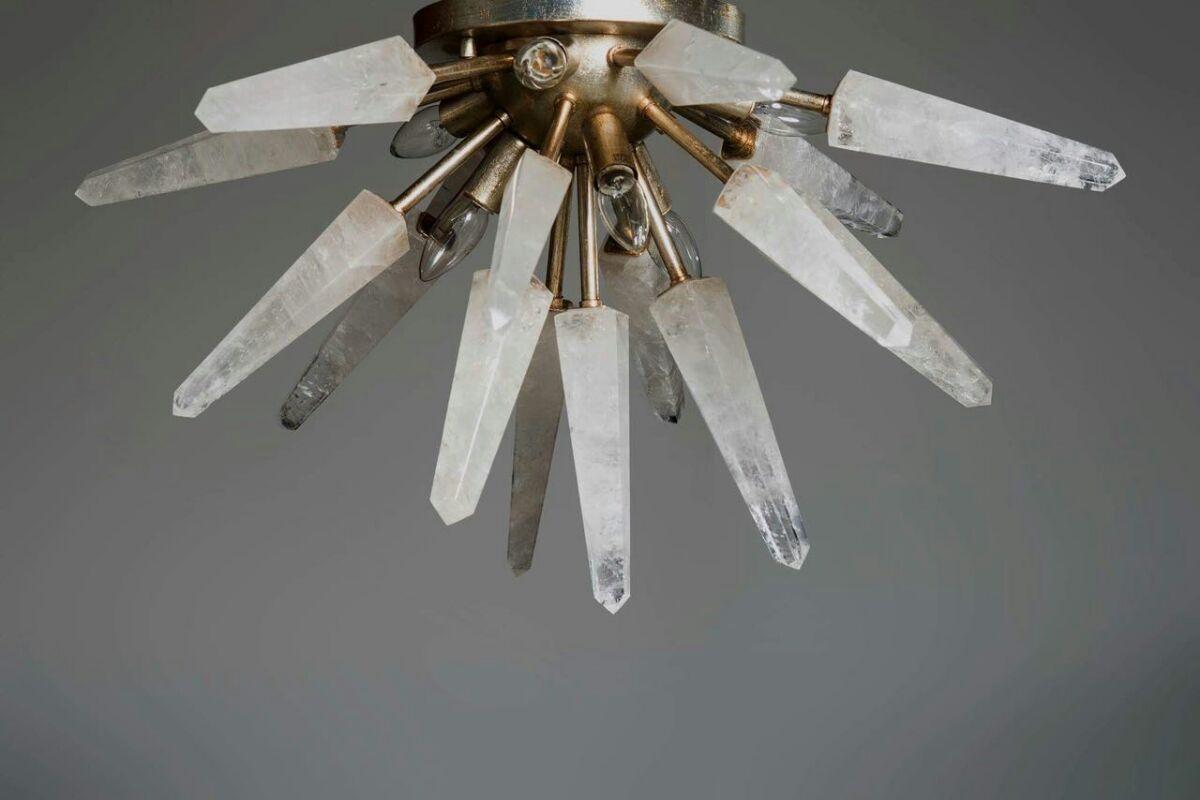 Natural white quartz Sputnik, iconic pendant lamp
Dimensions: Ø 55 cm
Lighting: 06 x E14 40W
Rock crystal: White quartz
Possible finishes: Silver leaf, old silver leaf, gold leaf, old gold leaf, copper leaf, rusty, pink golf, brass.


This is