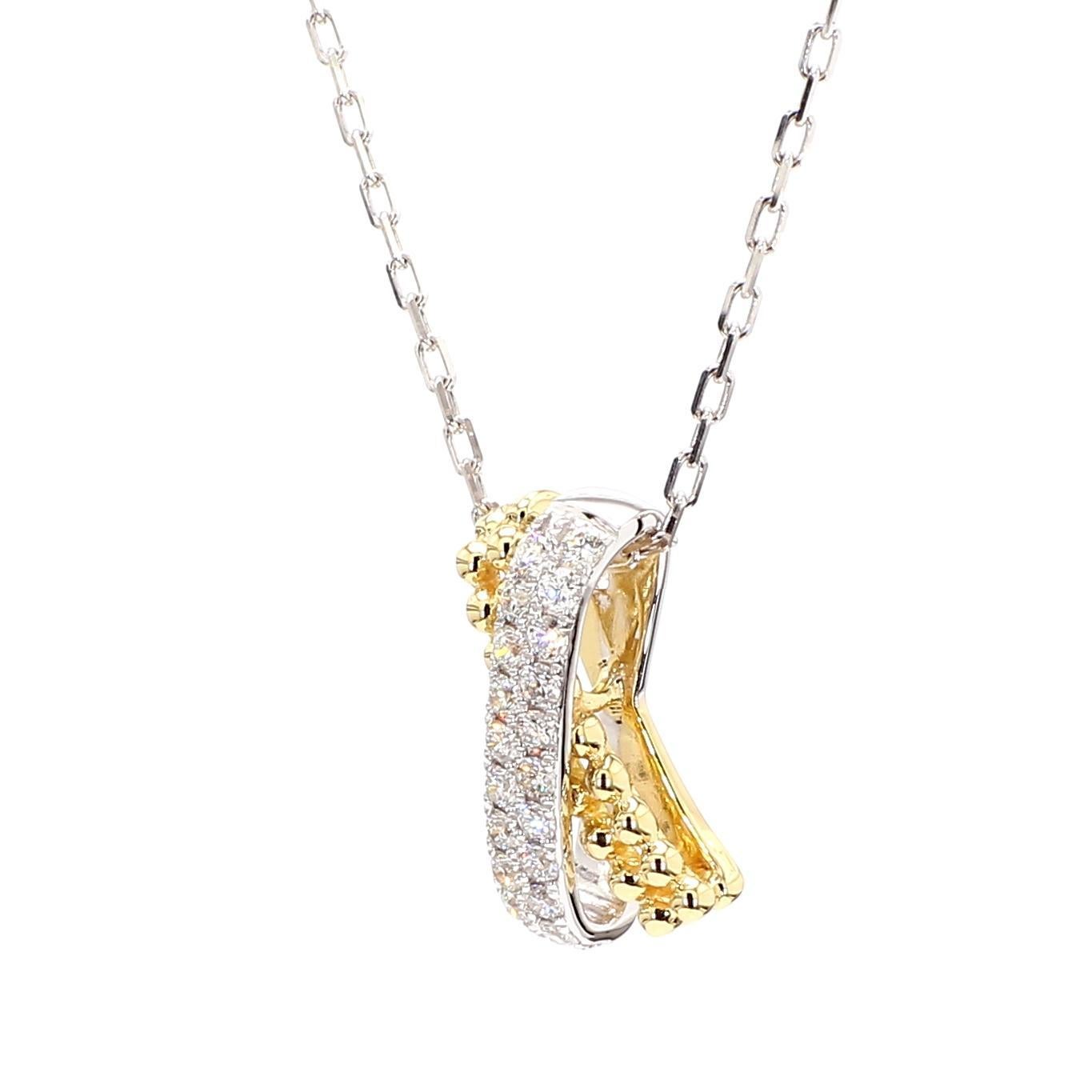 Le magnifique pendentif en diamant de Raregemworld. Monté dans une belle monture en or jaune et blanc 18K avec un mélee de diamants blancs ronds naturels. Ce pendentif est garanti pour impressionner et enrichir votre collection personnelle.

Poids