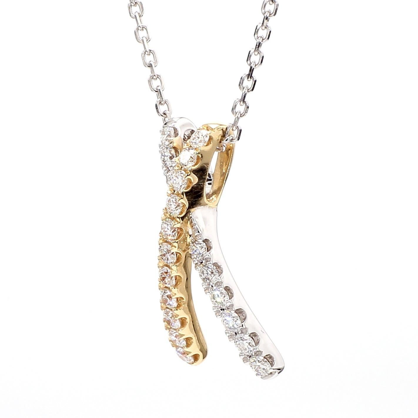 Le magnifique pendentif en diamant de Raregemworld. Monté dans une belle monture en or jaune et blanc 14K avec un mélee de diamants blancs ronds naturels. Ce pendentif est garanti pour impressionner et enrichir votre collection personnelle.

Poids