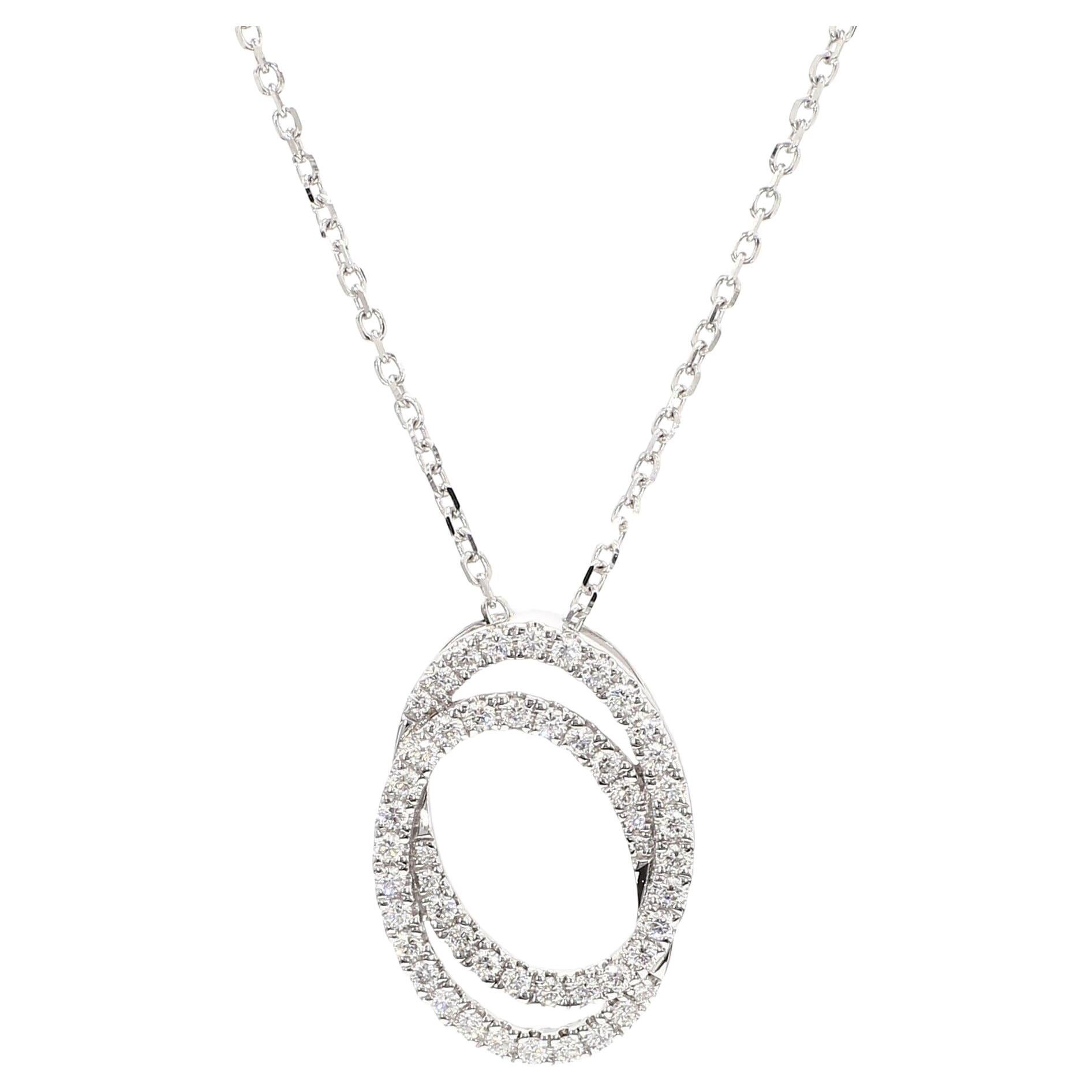 Ciondolo a goccia in oro bianco con diamante tondo naturale da 0.60 carati TW