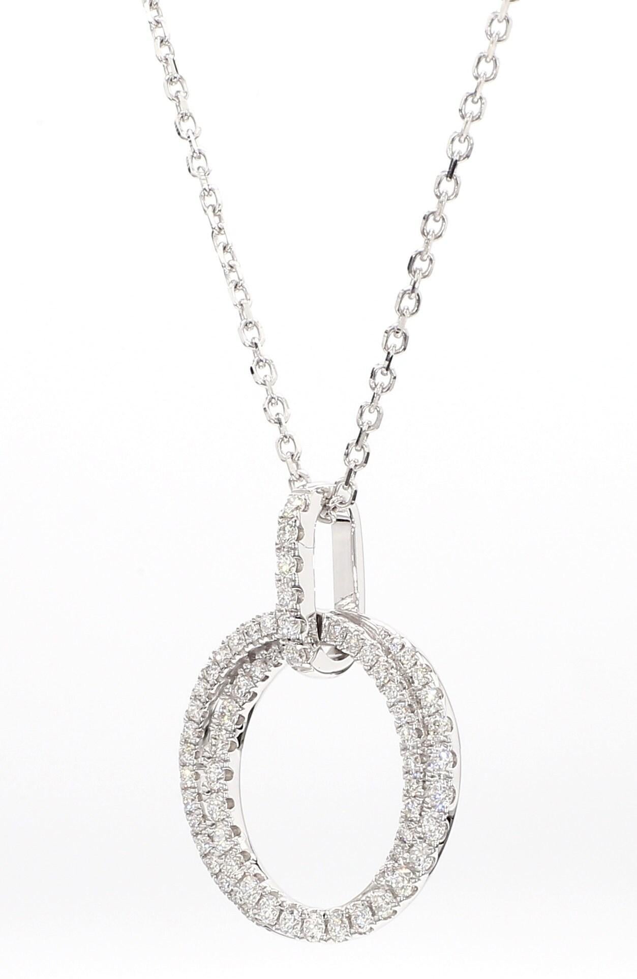 Le pendentif classique en diamant de Raregemworld. Monté dans une belle monture en or blanc 18 carats avec un mélee de diamants blancs ronds naturels. Ce pendentif est garanti pour impressionner et enrichir votre collection personnelle.

Poids total
