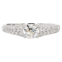 Bague de fiançailles en or blanc naturel avec diamant rond de 0.71 carat poids total