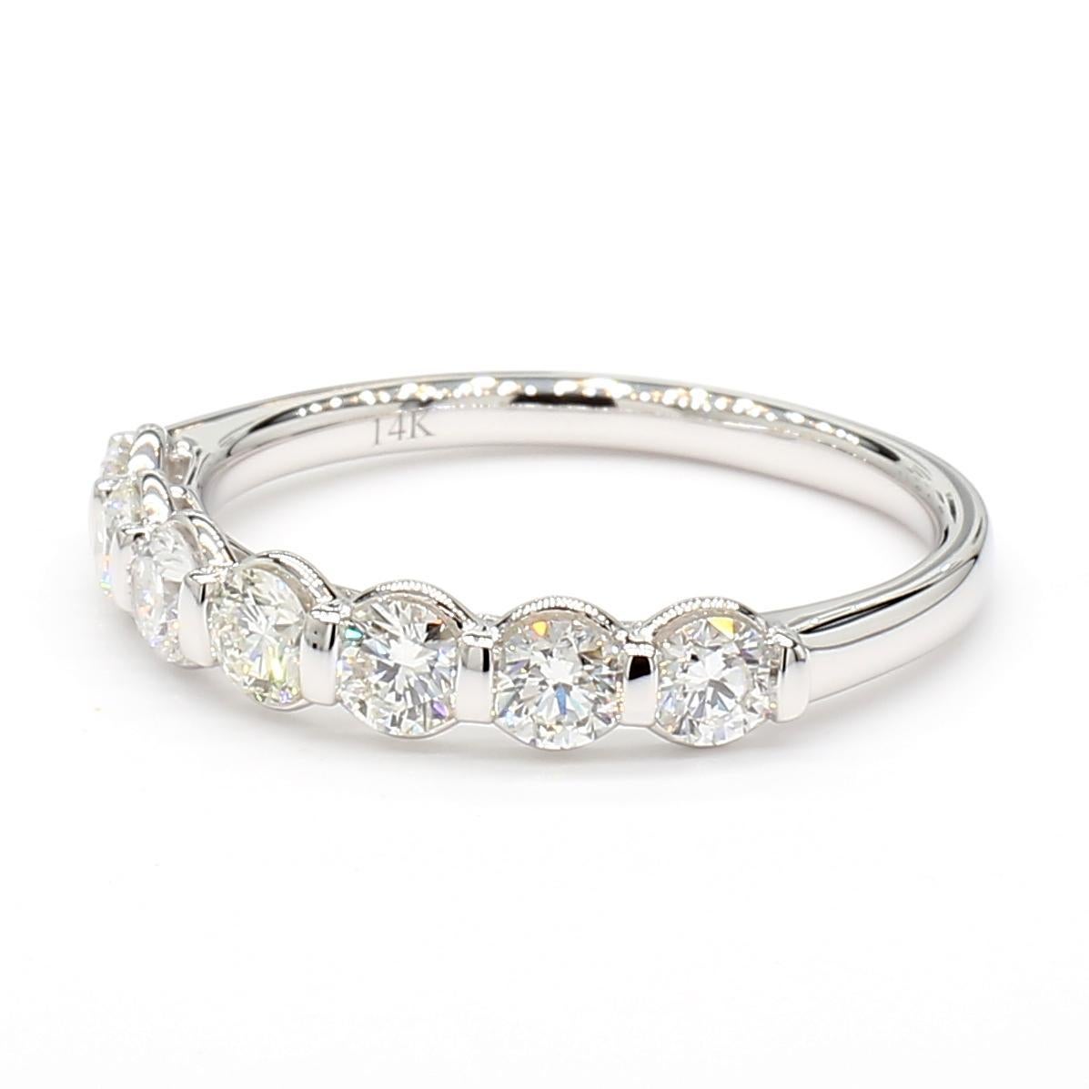 RareGemWorld's intriguing diamond band. Mounted in a beautiful 14K White Gold setting with natural round cut white diamonds. This band is guaranteed to impress and enhance your personal collection!

Total Weight: 0.81cts

Natural Round Cut White