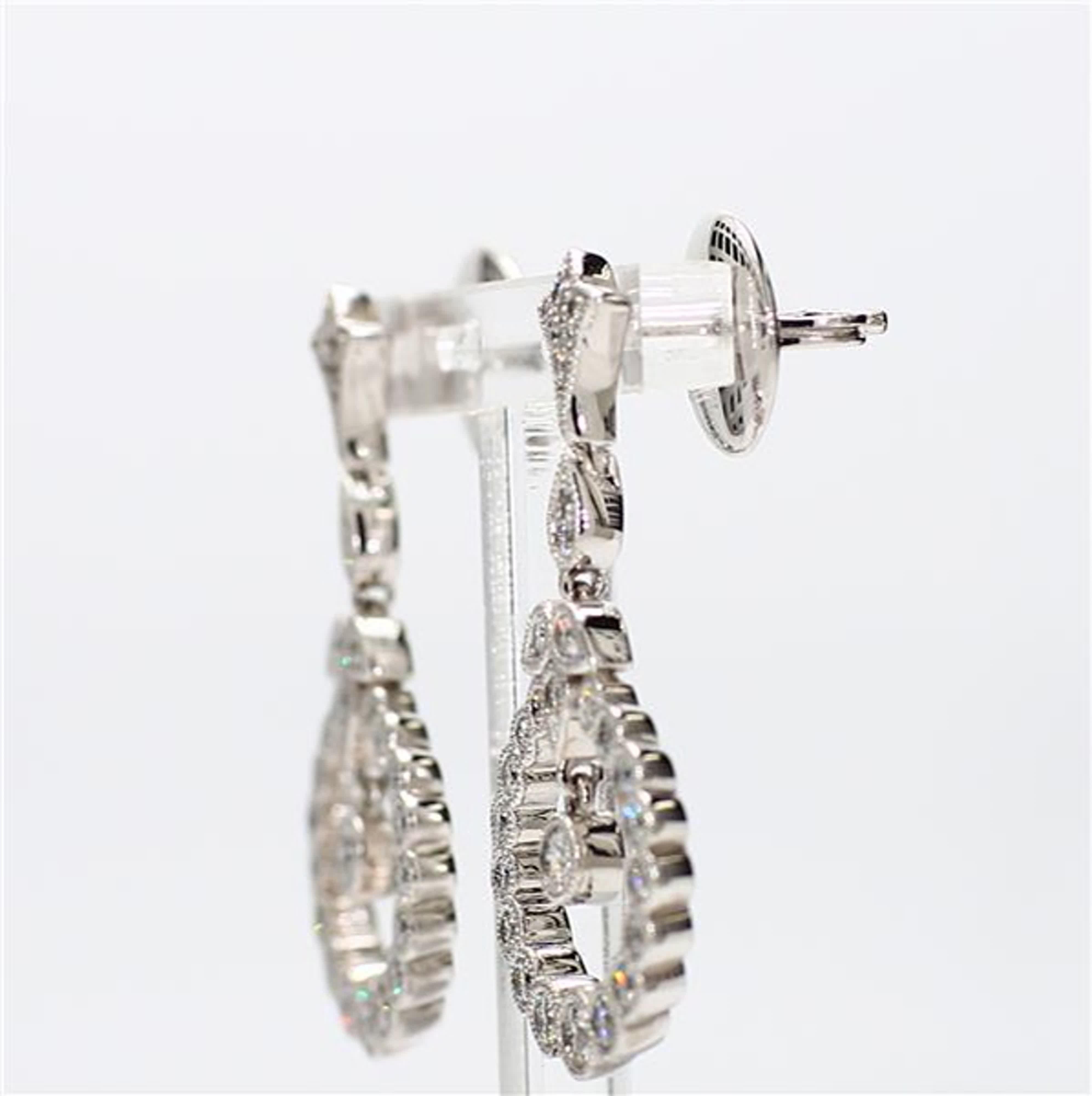 Contemporary Natural White Round Diamond 1.12 Carat TW White Gold Drop Earrings For Sale