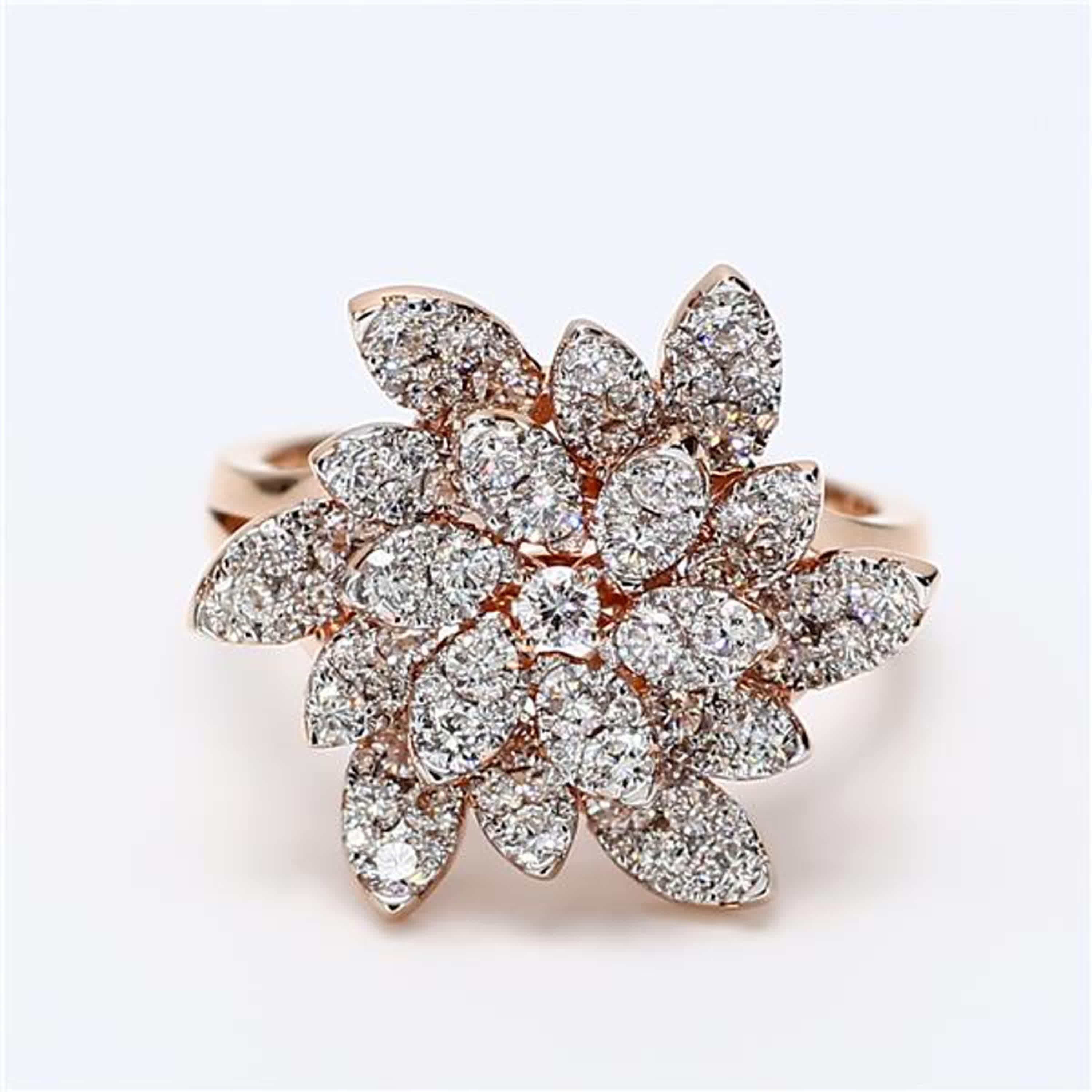 RareGemWorld's classic diamond ring. Mounted in a beautiful 18K Rose Gold setting with natural round white diamond melee in a beautiful flower shape. This ring is guaranteed to impress and enhance your personal collection!

Total Weight: