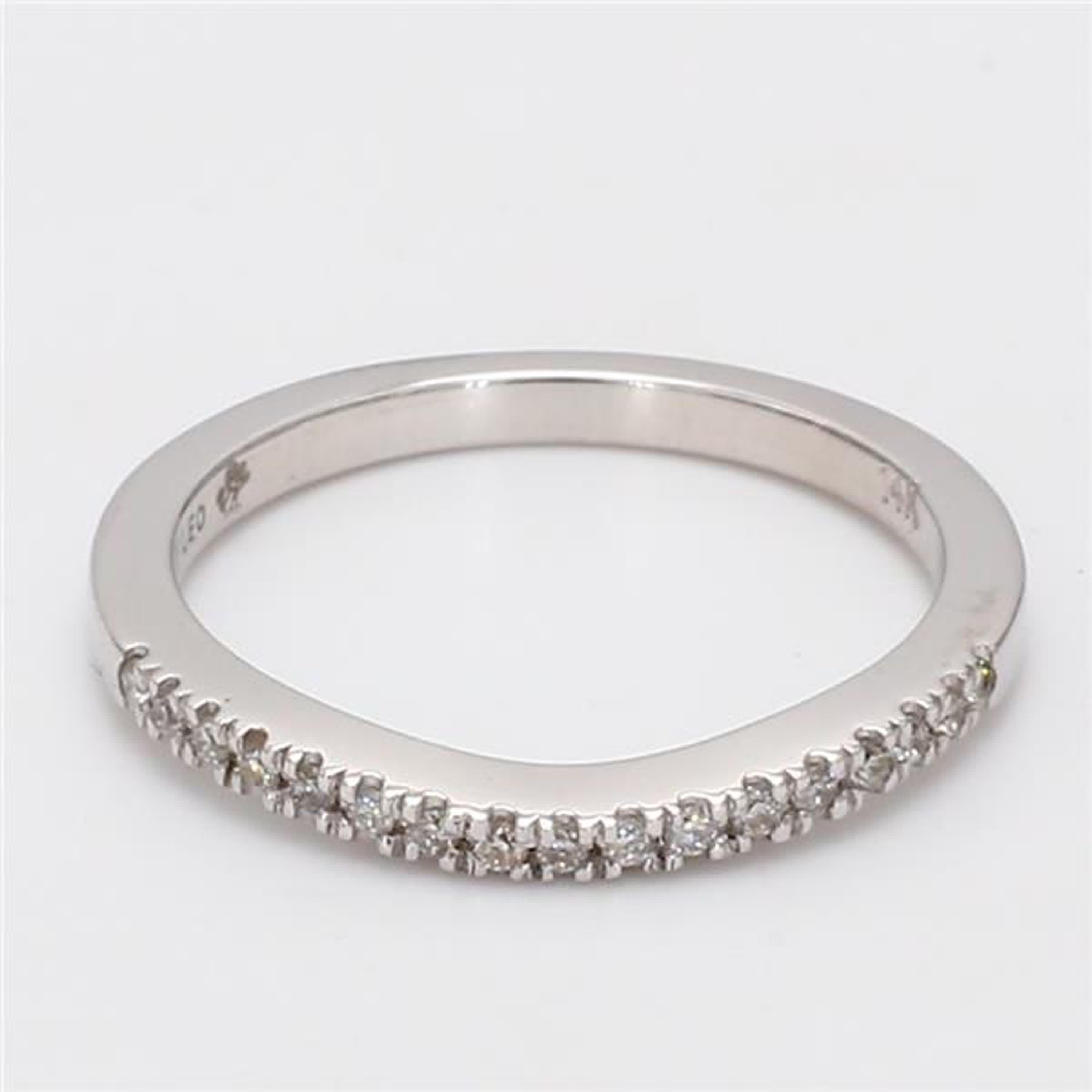 RareGemWorld's classic diamond band. Mounted in a beautiful 14K White Gold setting with natural round white diamond melee. This band is guaranteed to impress and enhance your personal collection!

Total Weight: .14cts

Natural Round White Diamonds