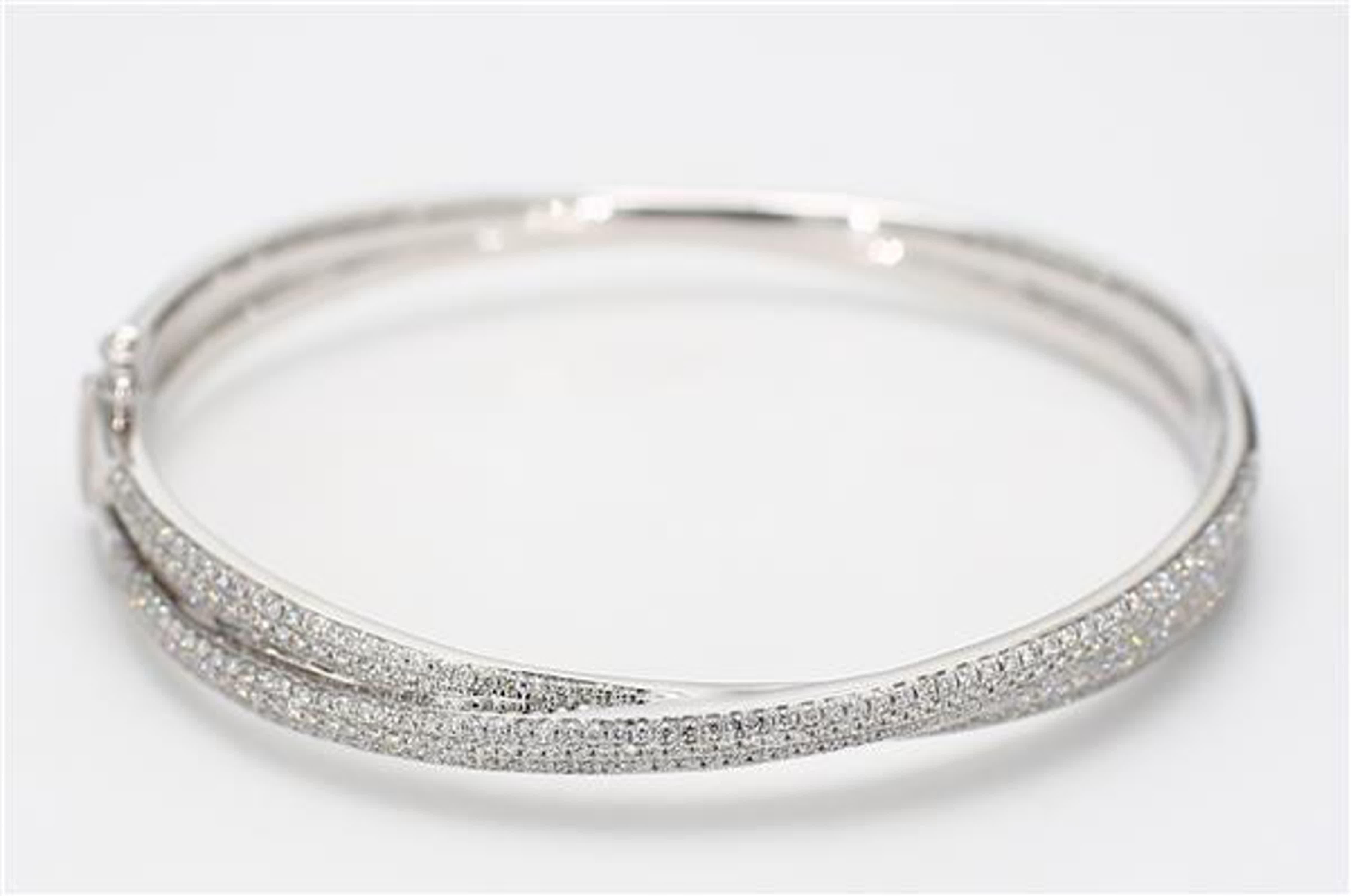 RareGemWorld's classic diamond bracelet. Mounted in a beautiful 18K White Gold setting with round natural white diamond melee. This bracelet is guaranteed to impress and enhance your personal collection.

Total Weight: 1.55cts

Natural Round White
