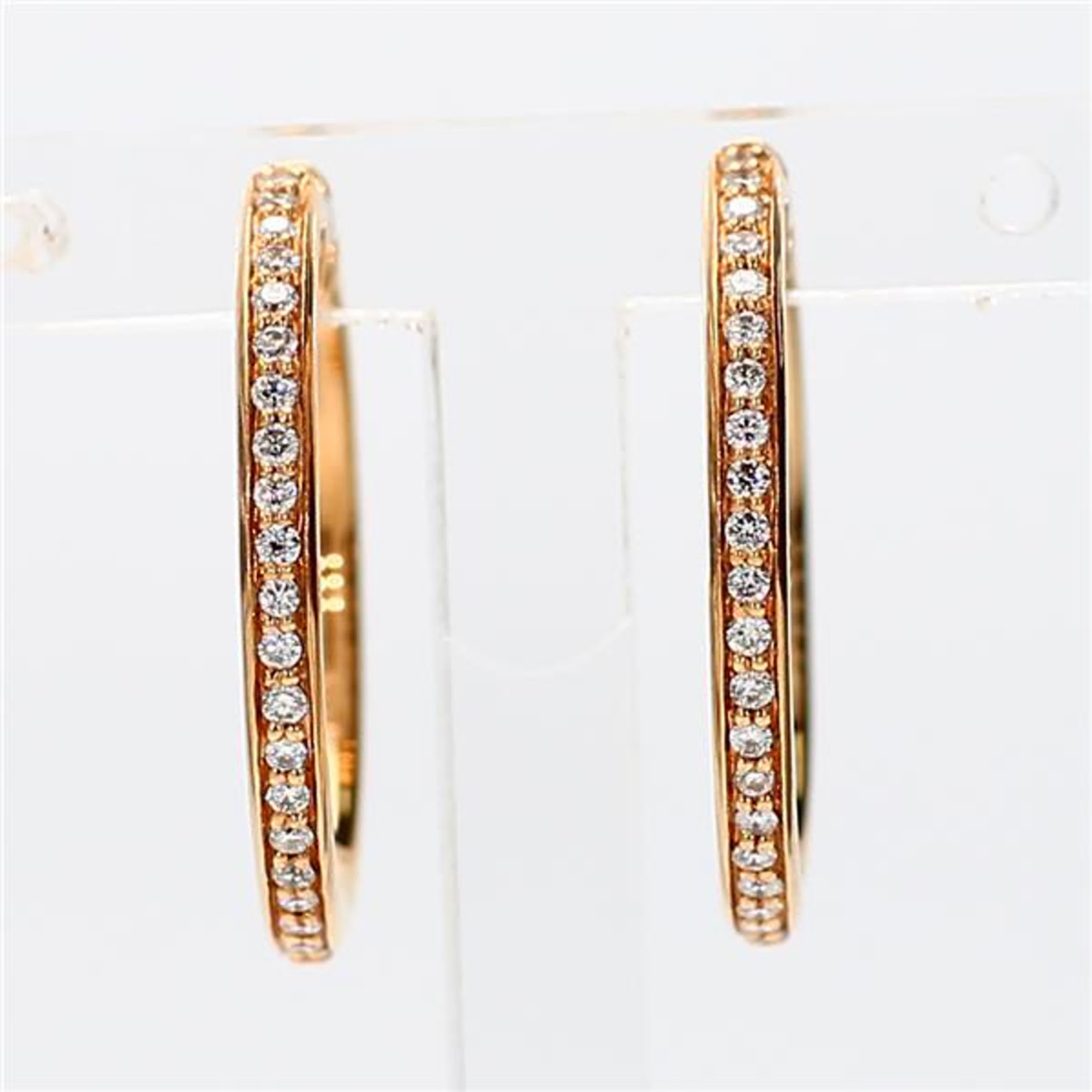 RareGemWorld's classic natural round cut white diamond earrings. Mounted in a beautiful 18K Yellow Gold setting with natural round cut white diamond melee along the hoop. These earrings are guaranteed to impress and enhance your personal